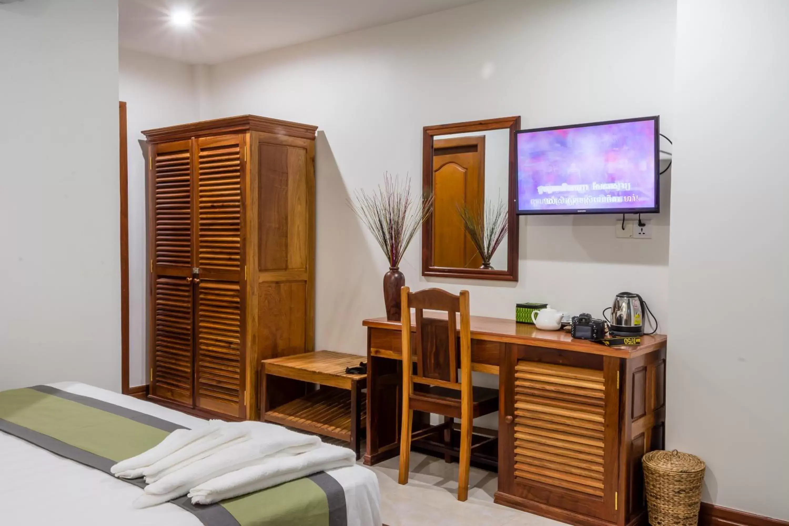 Bedroom, TV/Entertainment Center in Relax Hotel