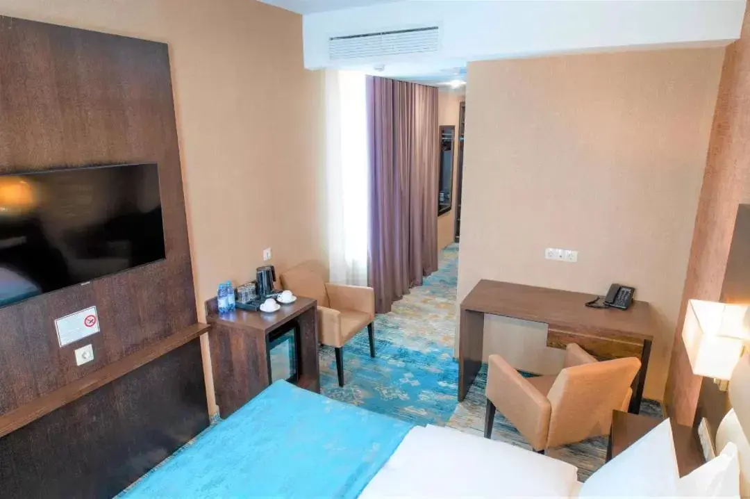 TV and multimedia, TV/Entertainment Center in Best Western Plus Oskemen