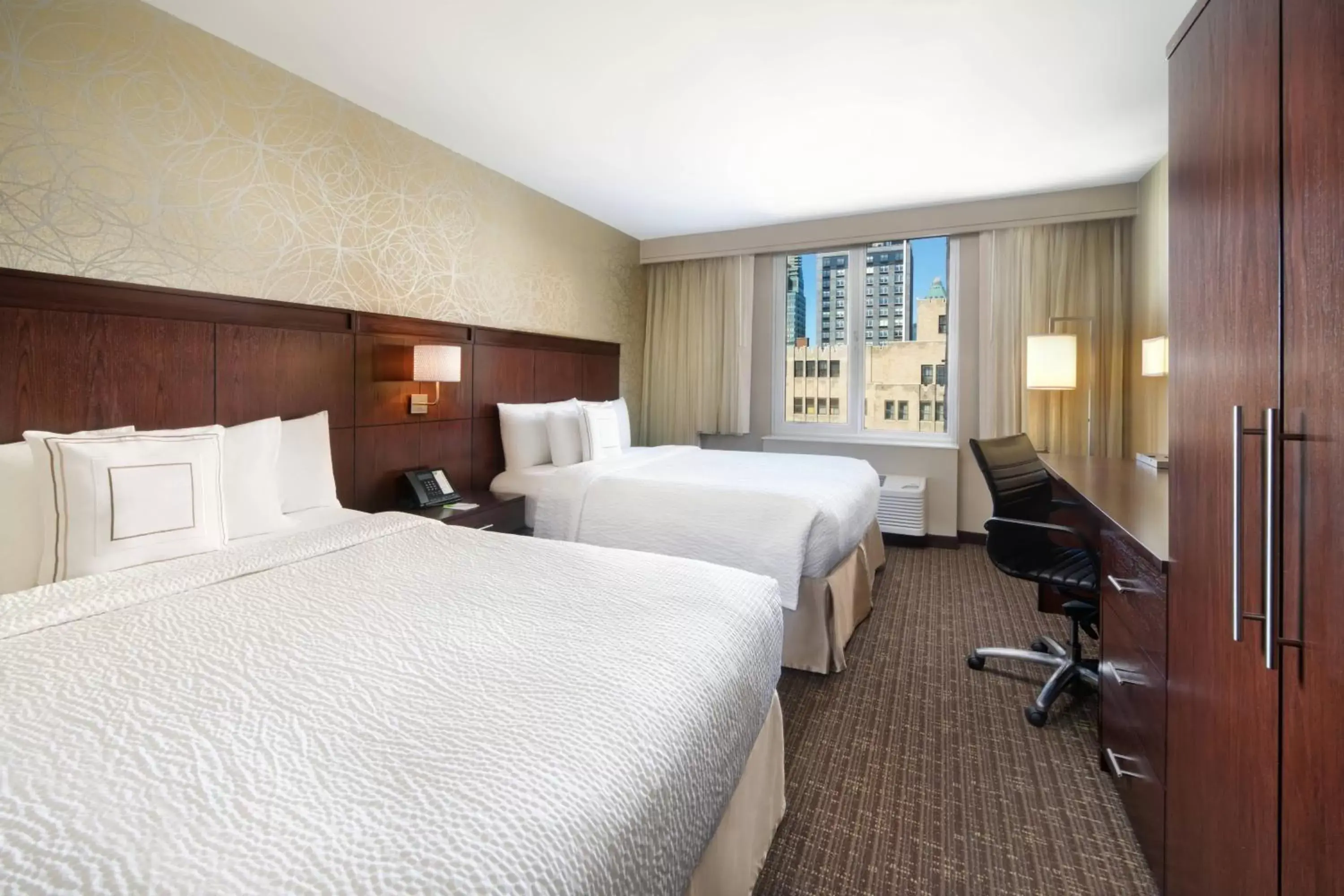 Photo of the whole room in Courtyard by Marriott Times Square West