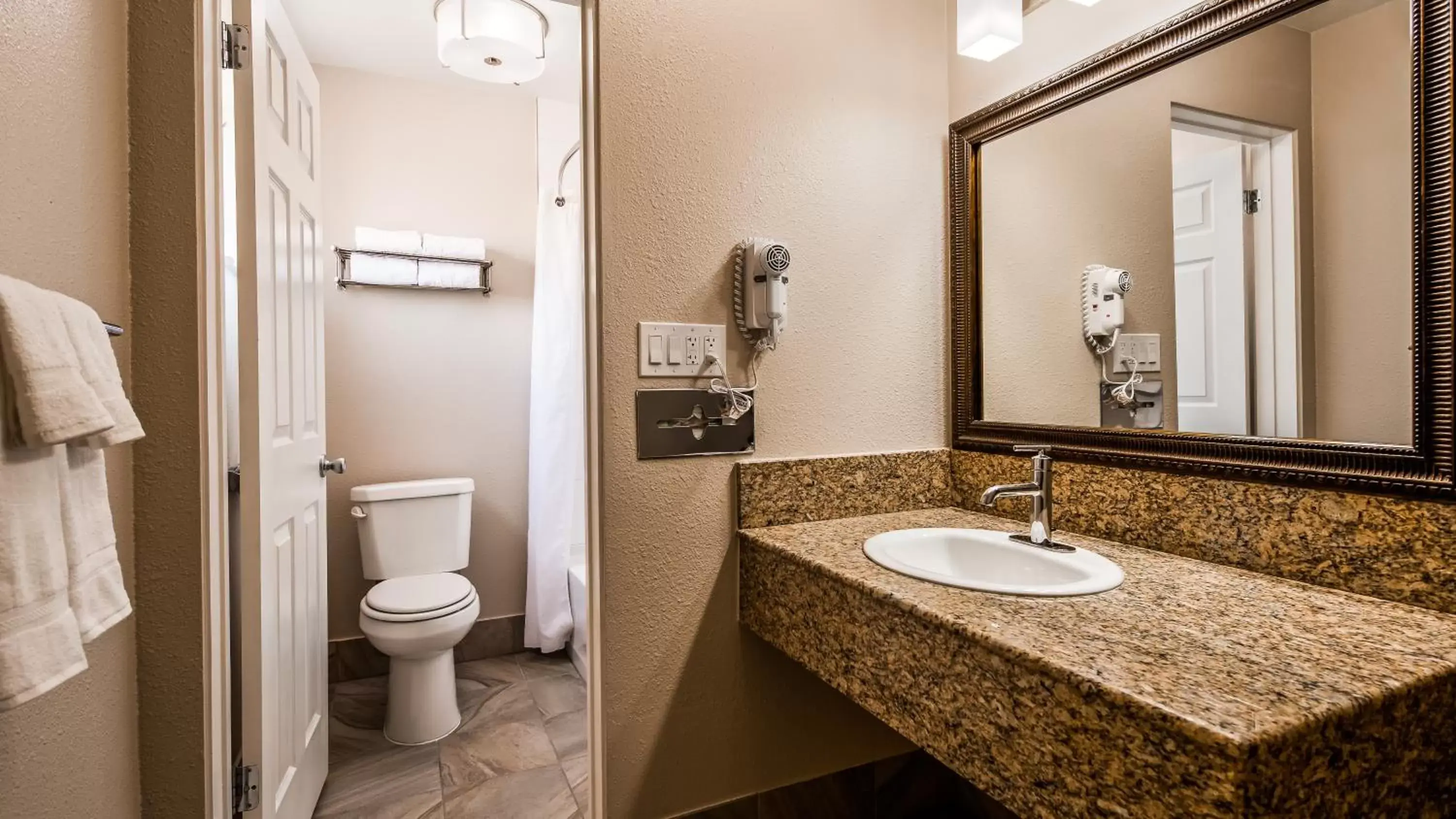 Toilet, Bathroom in Best Western Paradise Inn