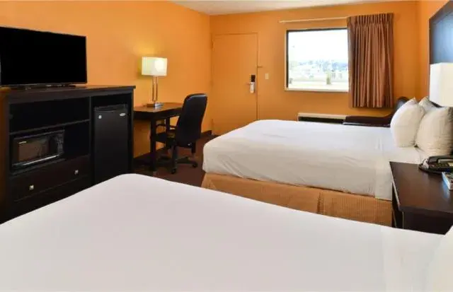 Bed in Americas Best Value Inn Byram Bed in Americas Best Value Inn Byram