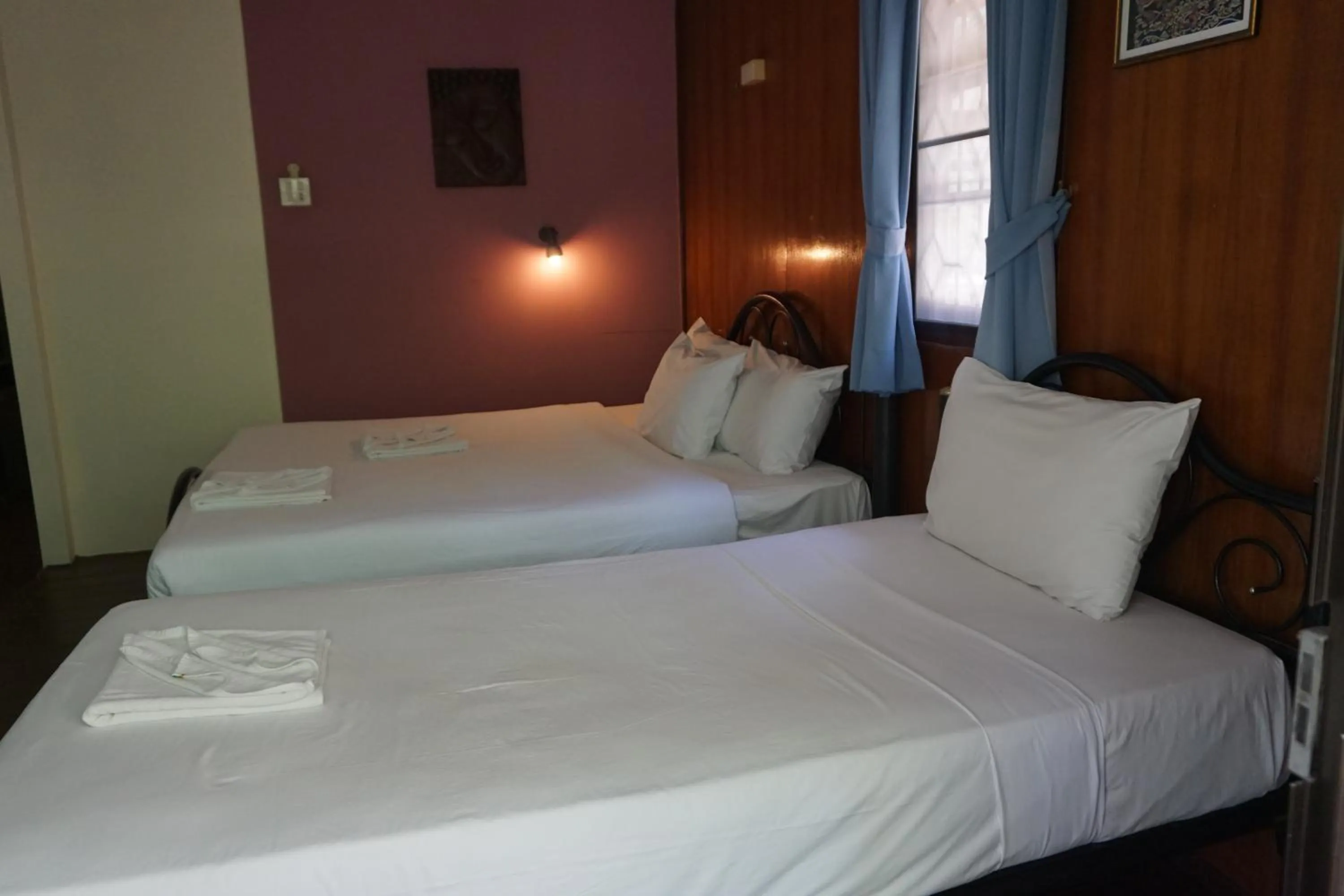 Bed in Moonhut Bungalows