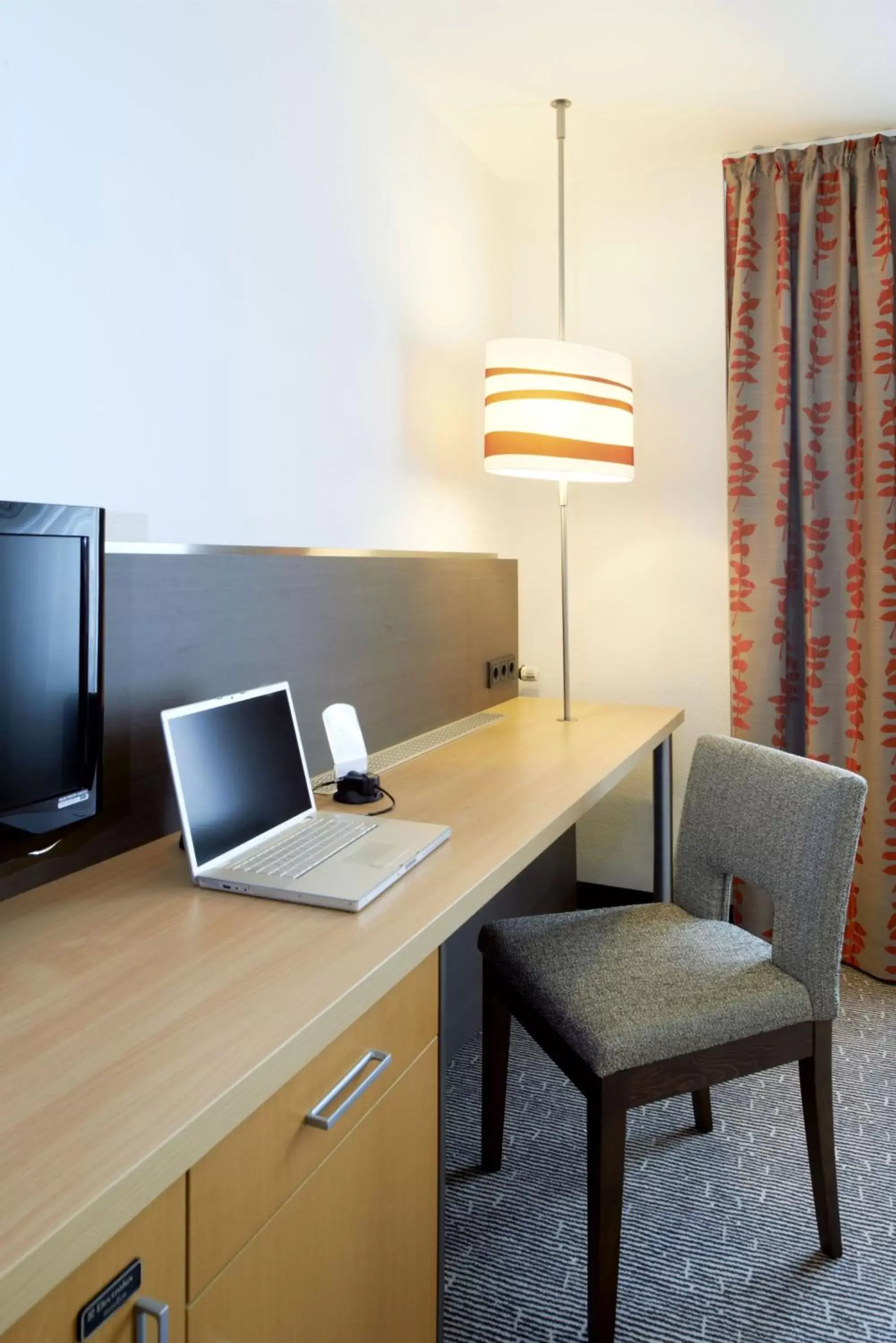 TV and multimedia, TV/Entertainment Center in Holiday Inn Essen City Centre, an IHG Hotel