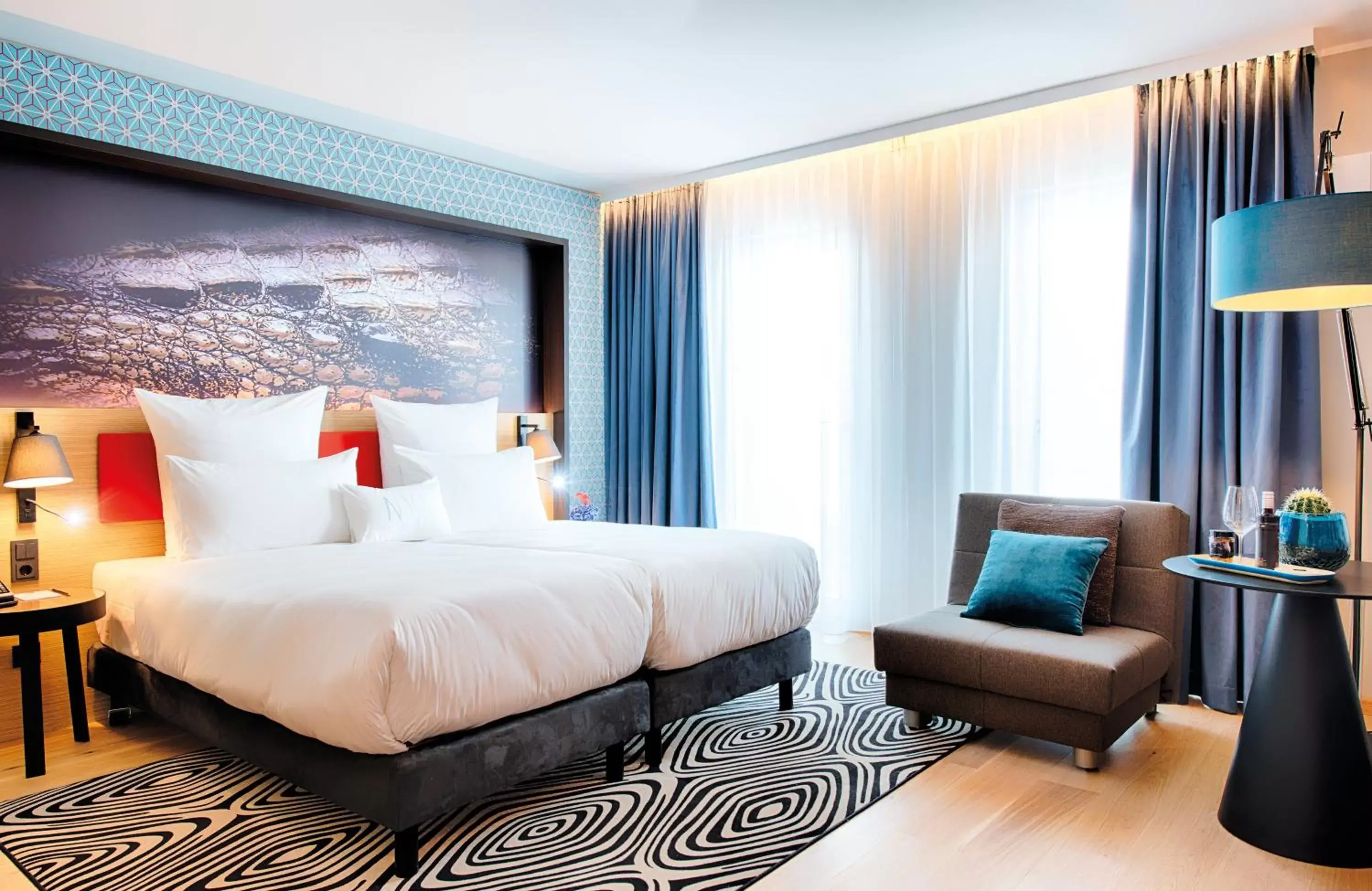 Photo of the whole room, Bed in NYX Hotel Munich by Leonardo Hotels