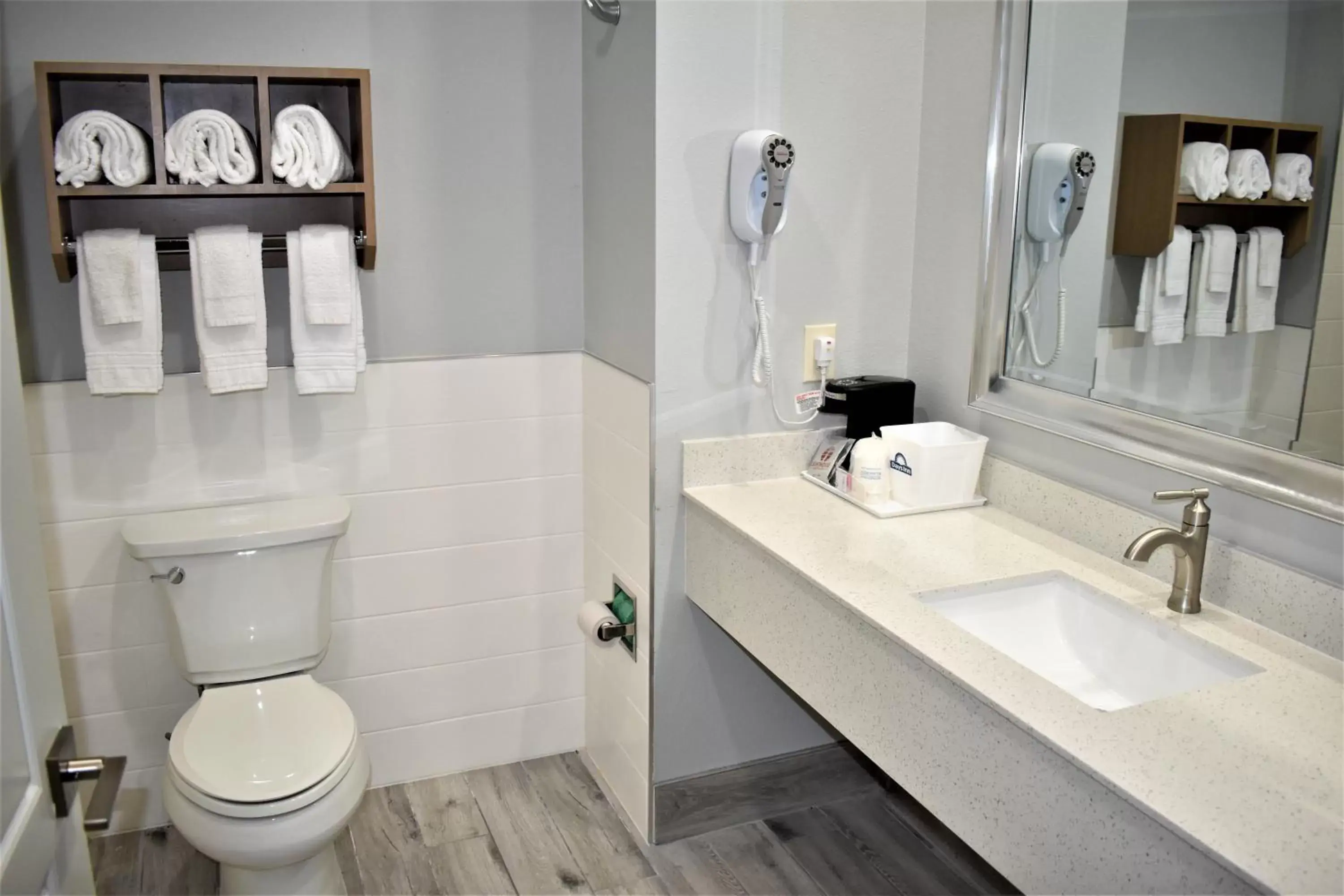 Bathroom in Days Inn & Suites by Wyndham Downtown/University of Houston