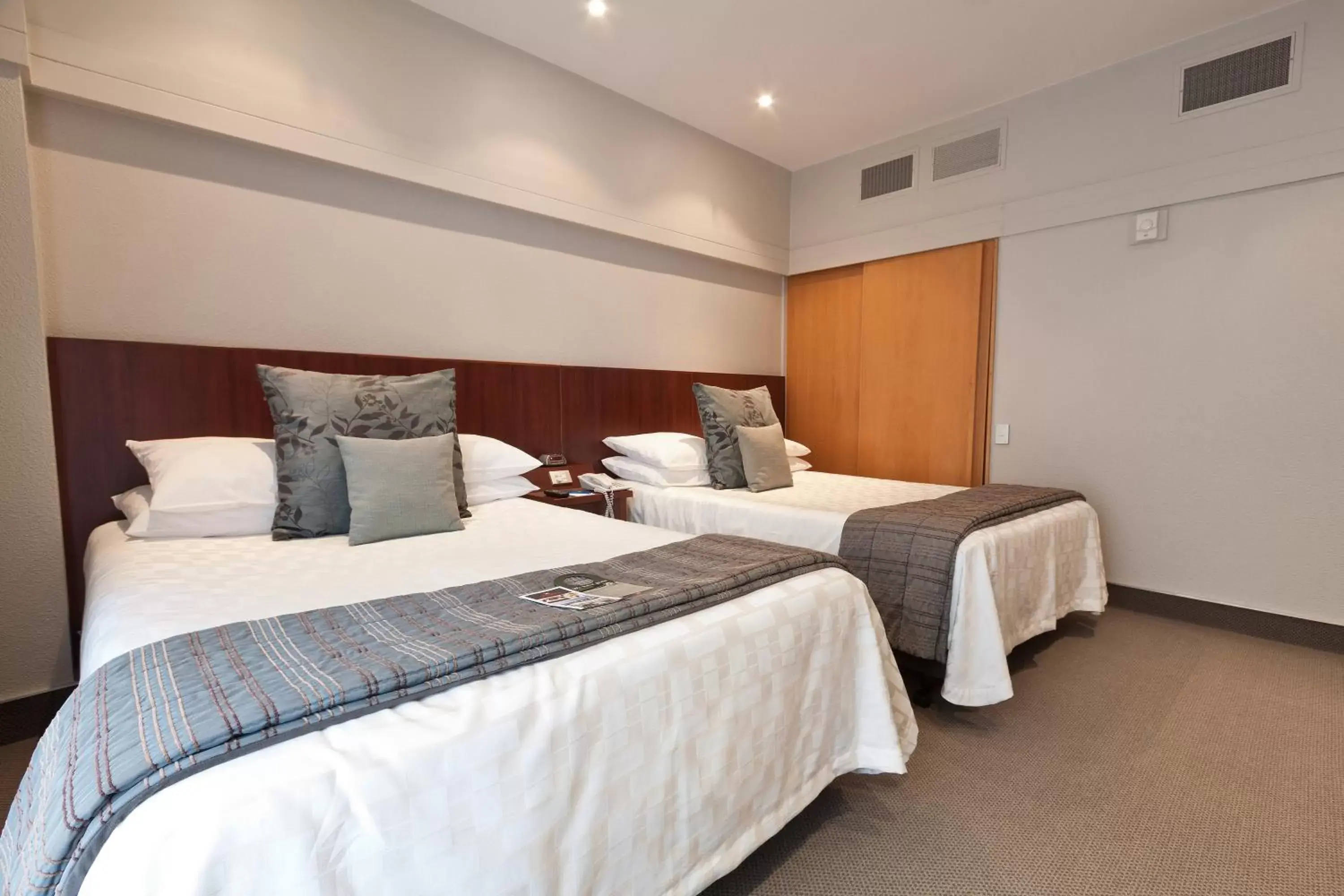 Bed in James Cook Hotel Grand Chancellor