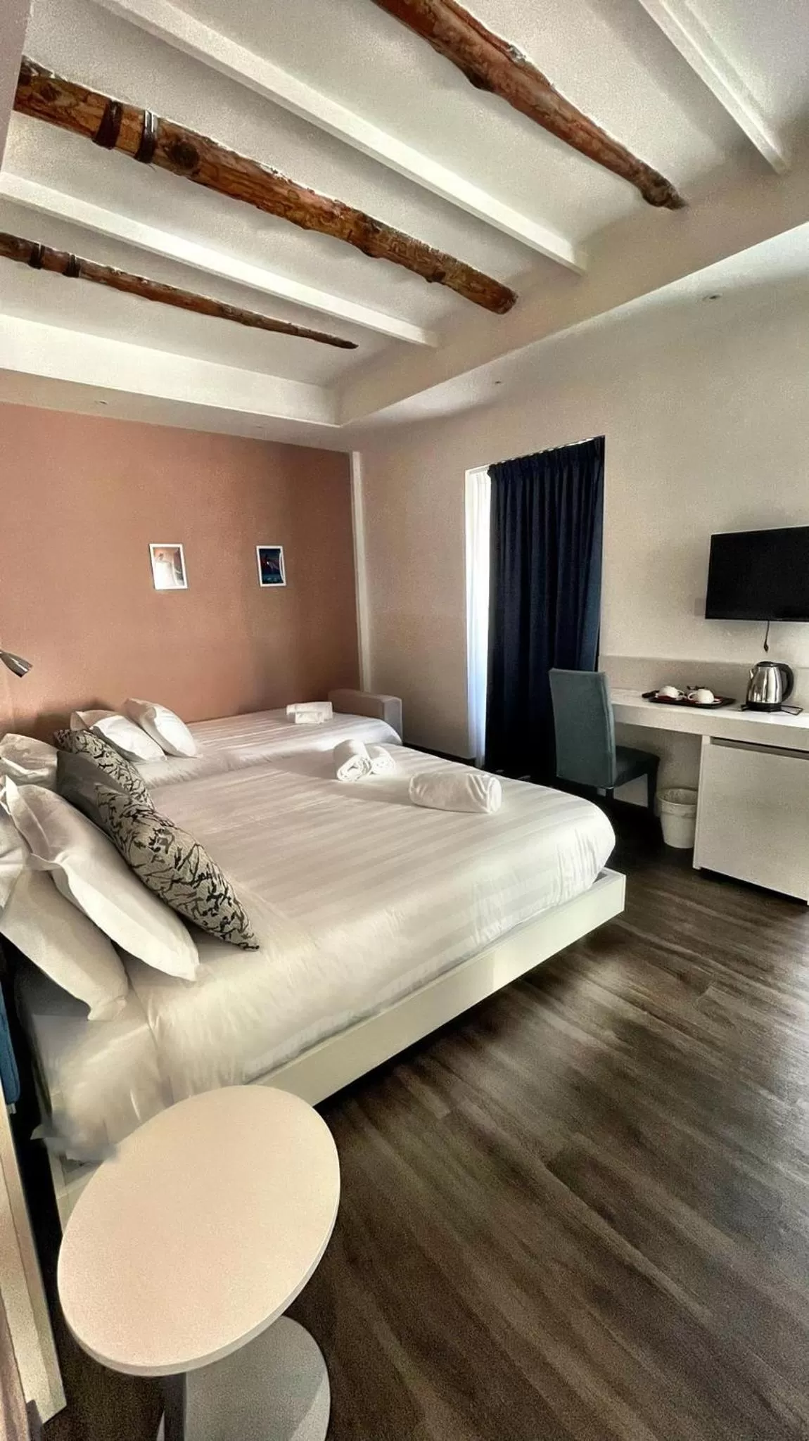 Bed in Palazzo Cappuccini Art Relais