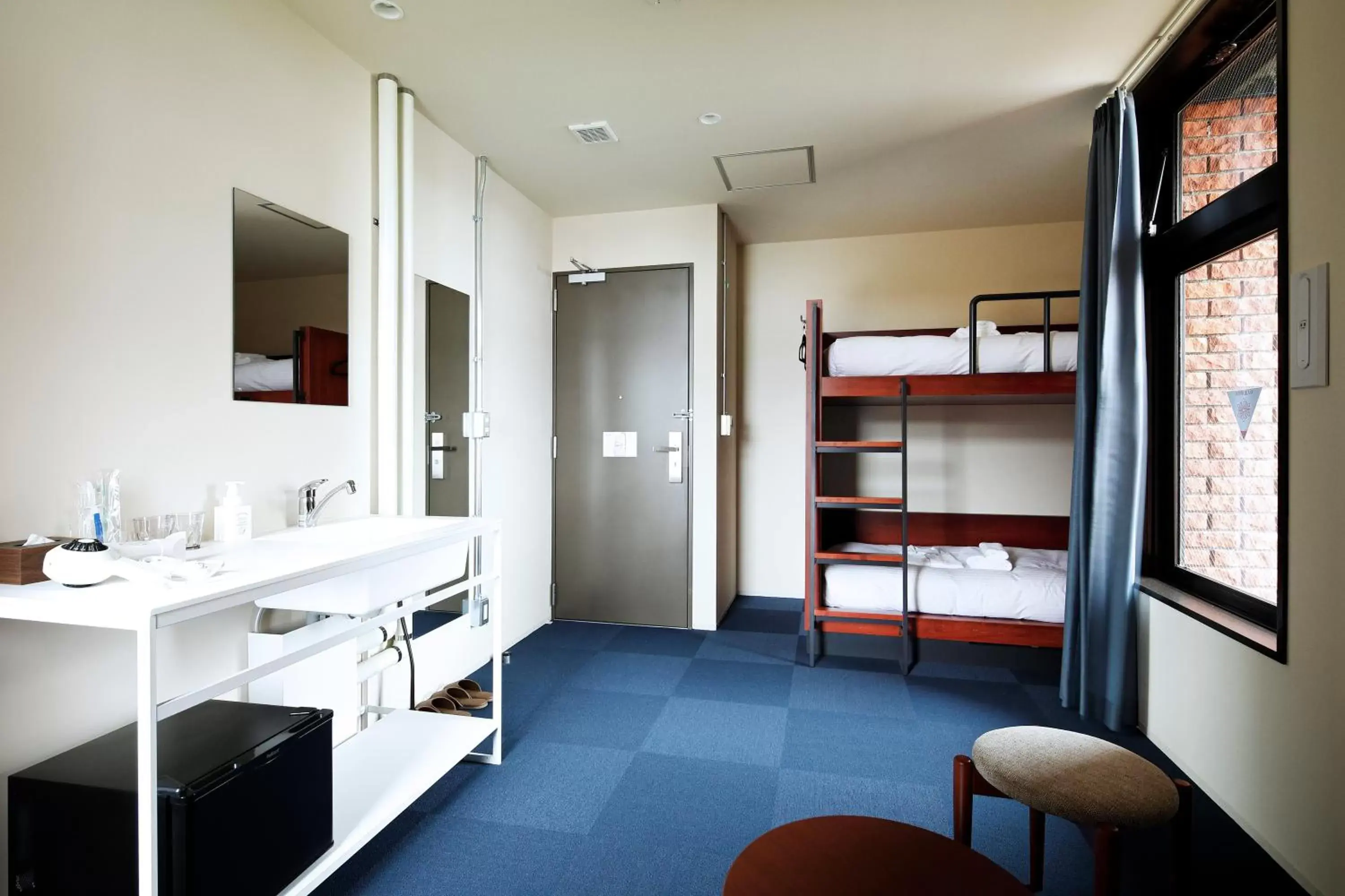 Photo of the whole room, Bathroom in HakoBA Hakodate by THE SHARE HOTELS