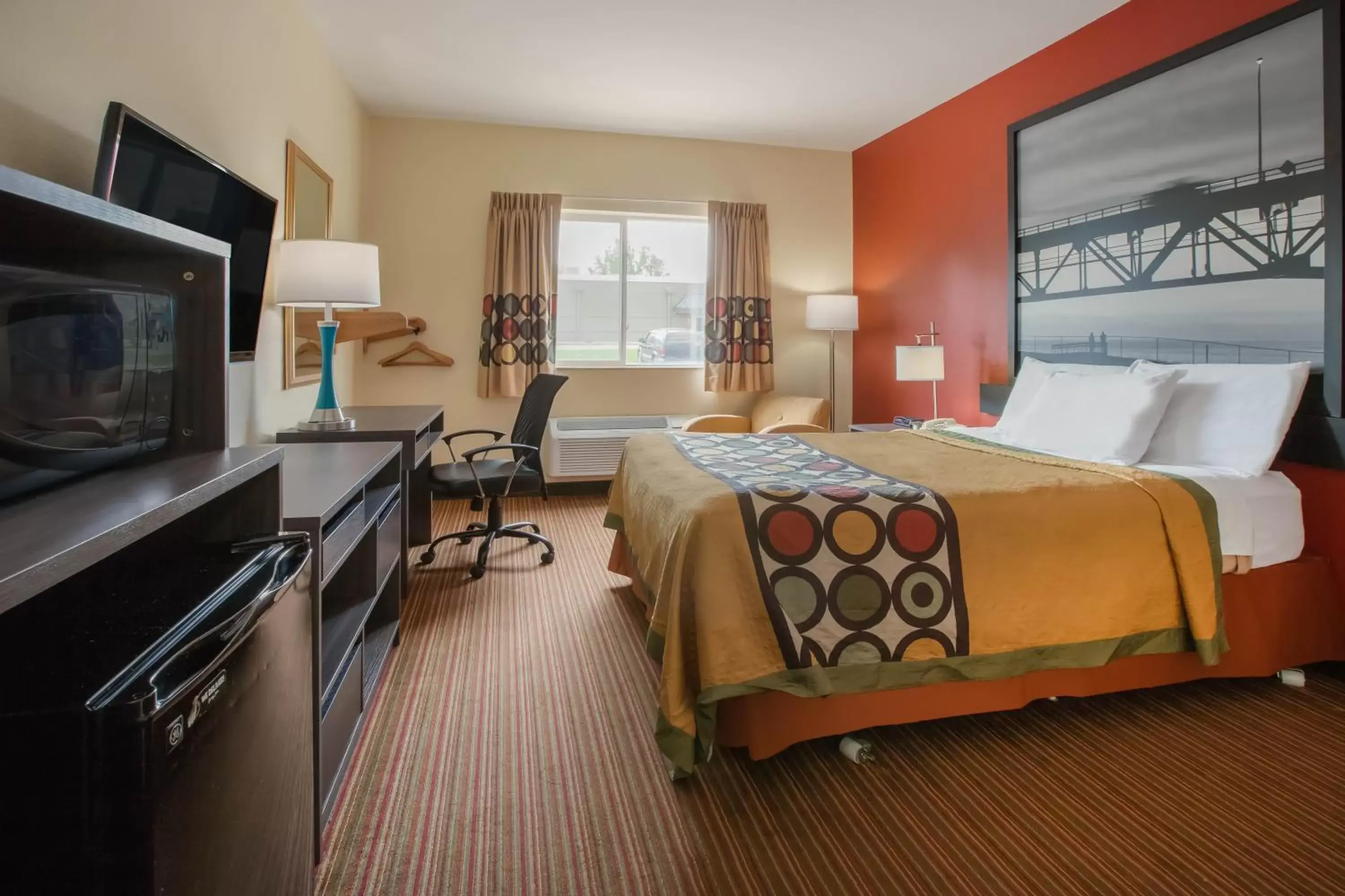 Photo of the whole room, TV/Entertainment Center in Super 8 by Wyndham Big Rapids