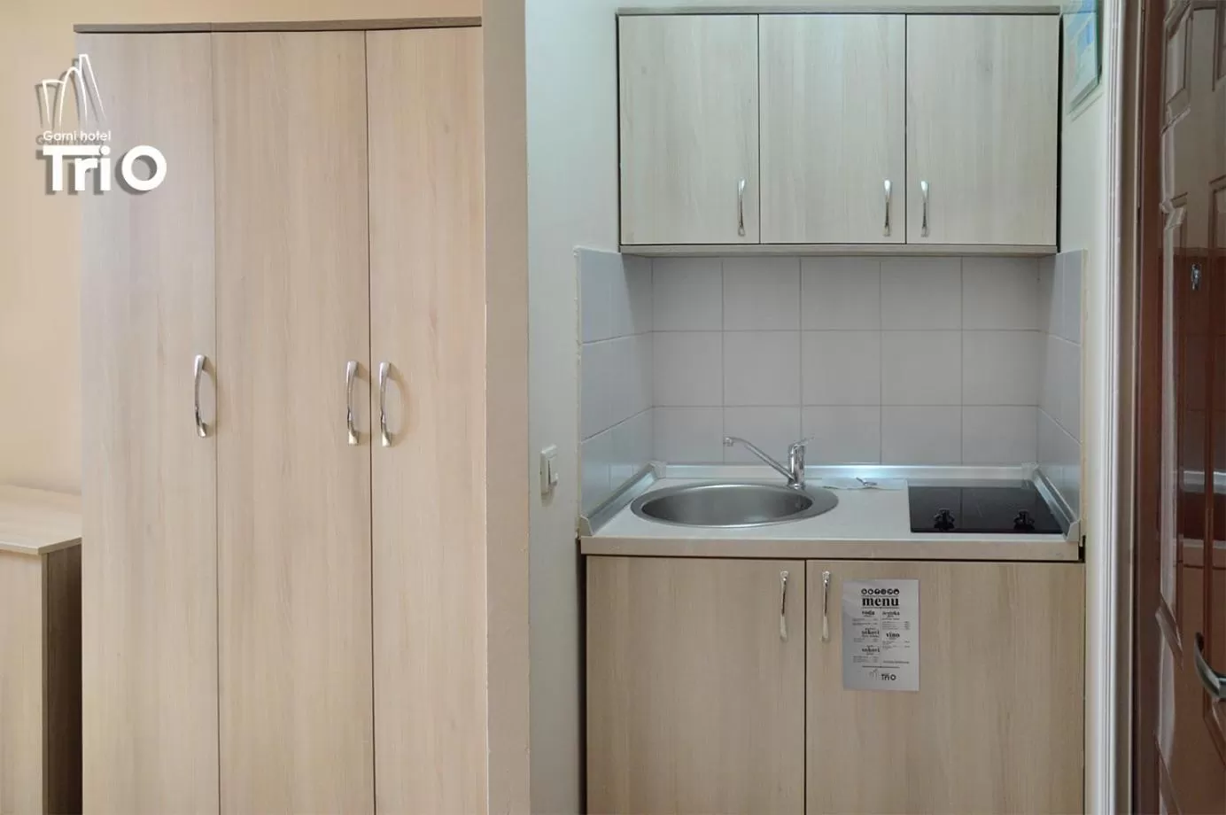 Kitchen or kitchenette in Garni Hotel Tri O