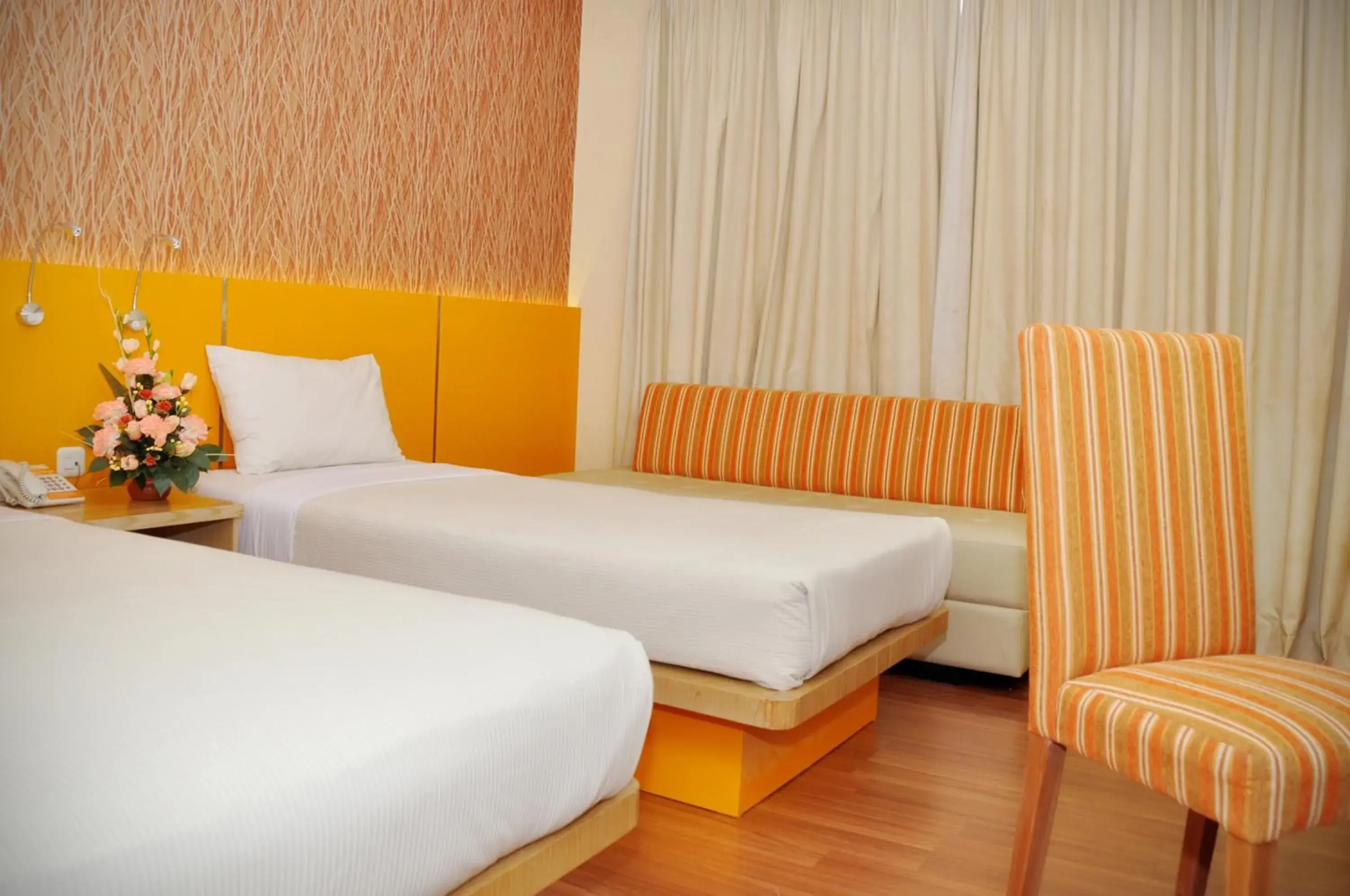 Bed in Pandanaran Hotel