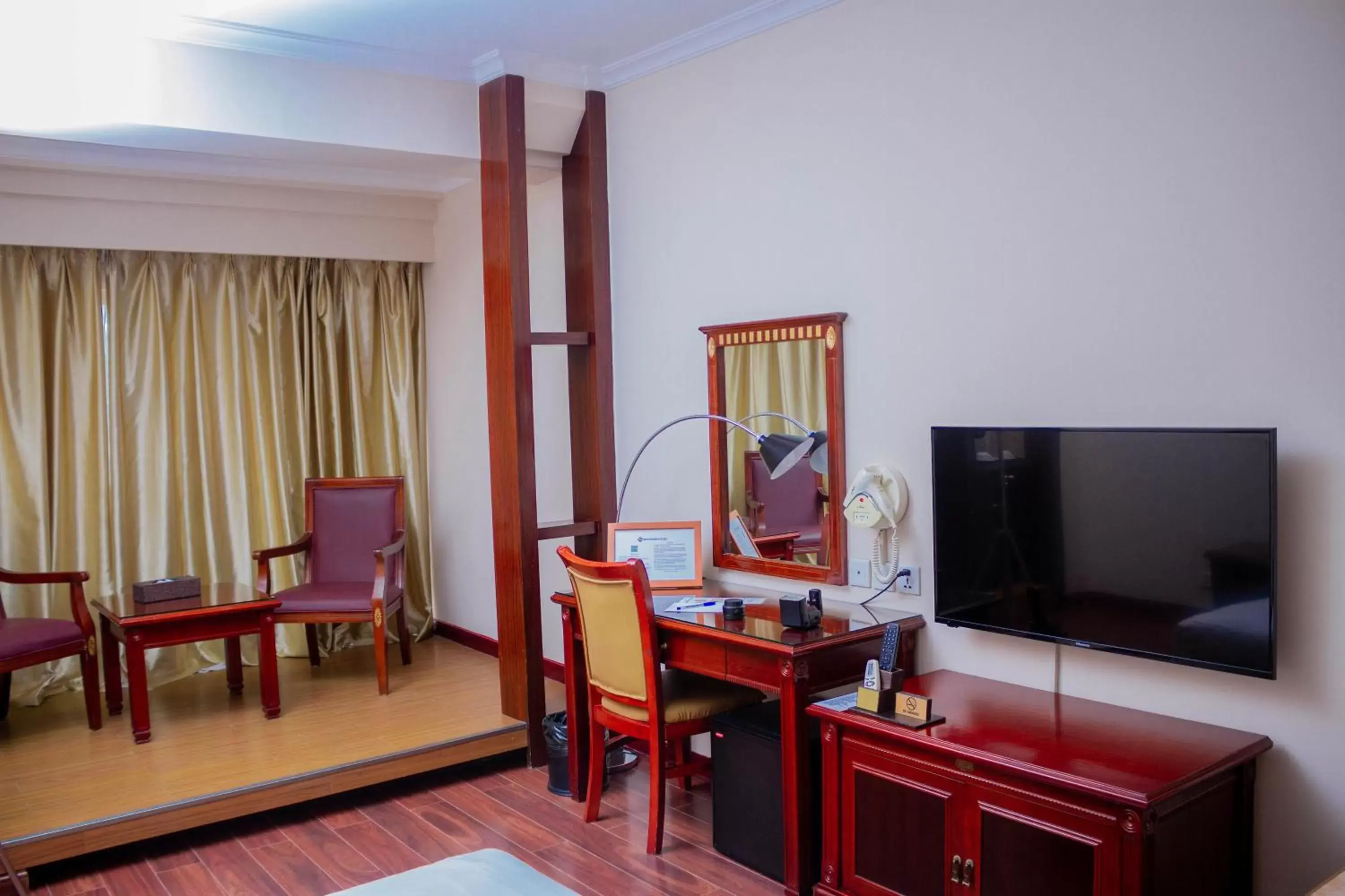 Communal lounge/ TV room, TV/Entertainment Center in Best Western Plus Lusaka Hotel