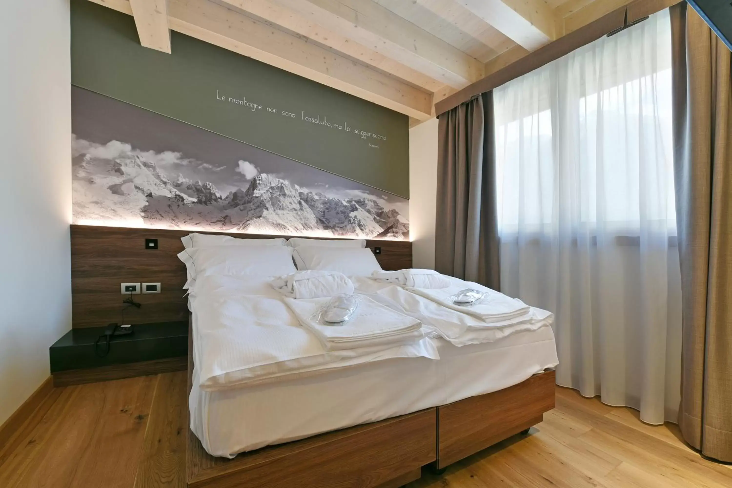 Bed in Dolomeet Boutique Hotel
