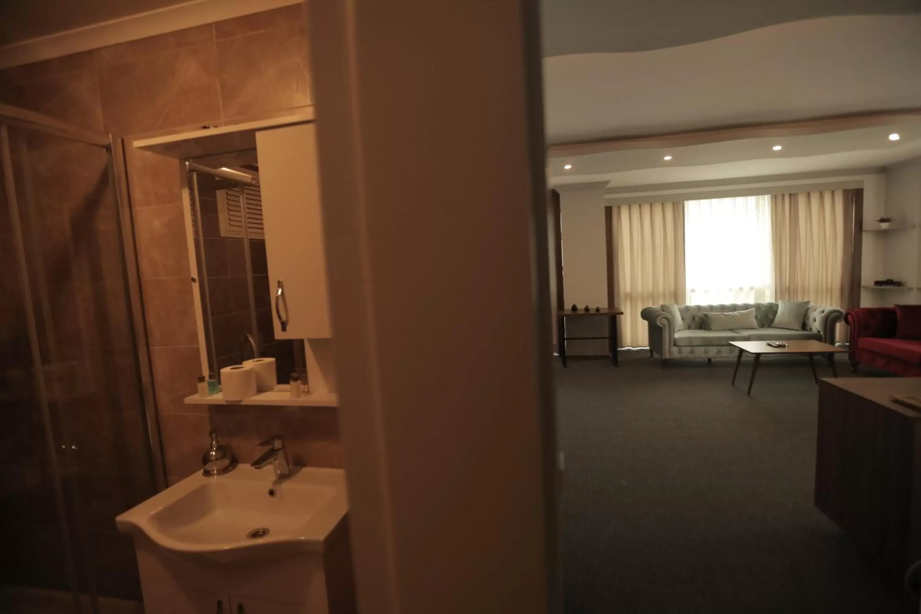 Bathroom in TEVETOGLU HOTEL