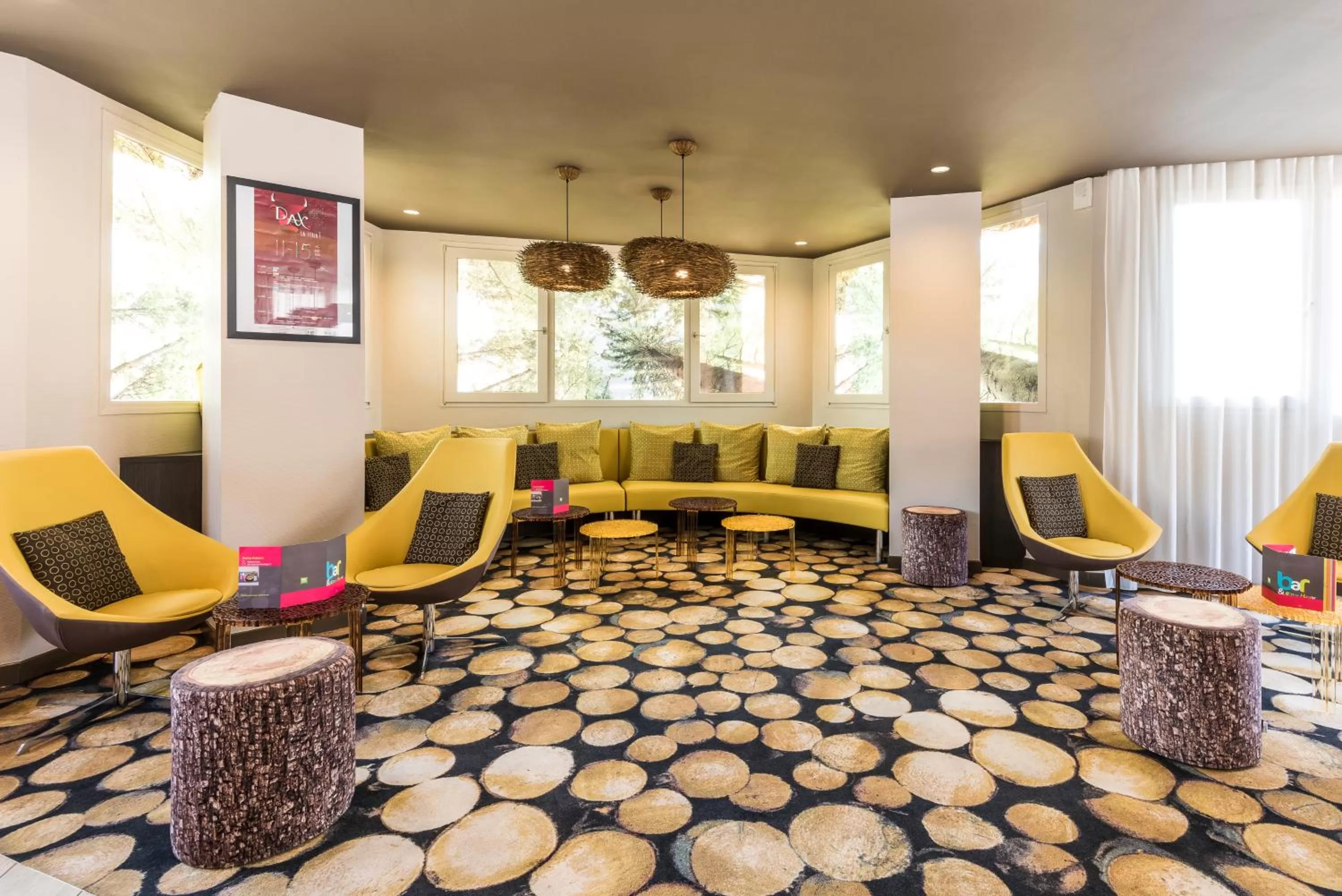 Communal lounge/ TV room in ibis styles Dax Centre