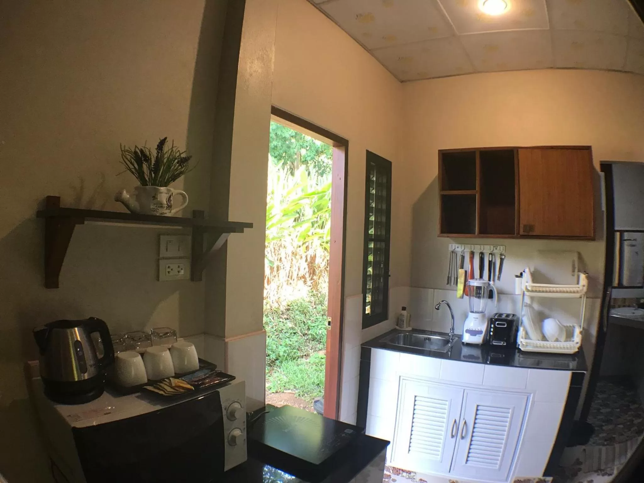 Kitchen or kitchenette in Fine Times Resort