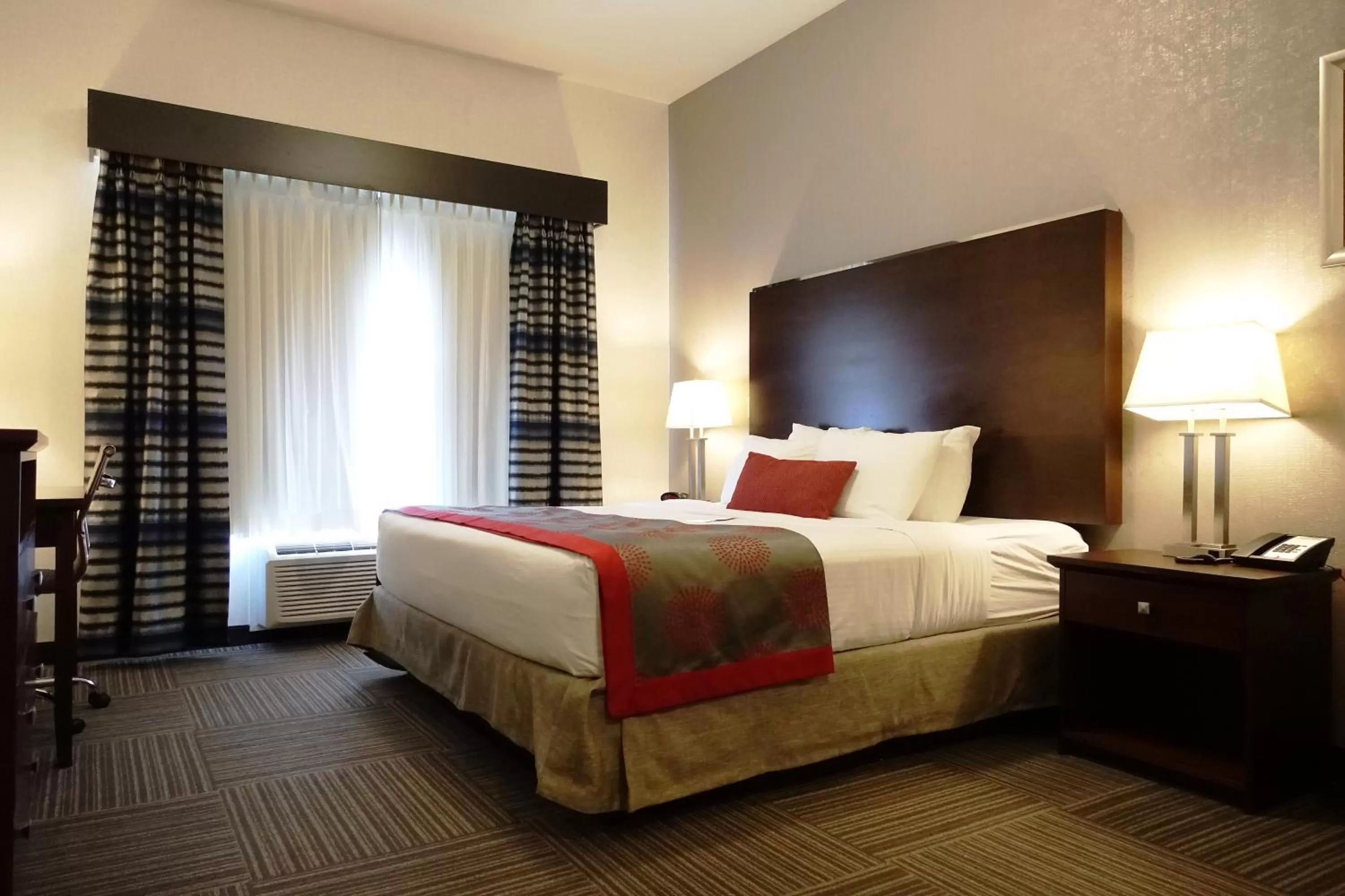 Photo of the whole room, Bed in Ramada by Wyndham Moose Jaw