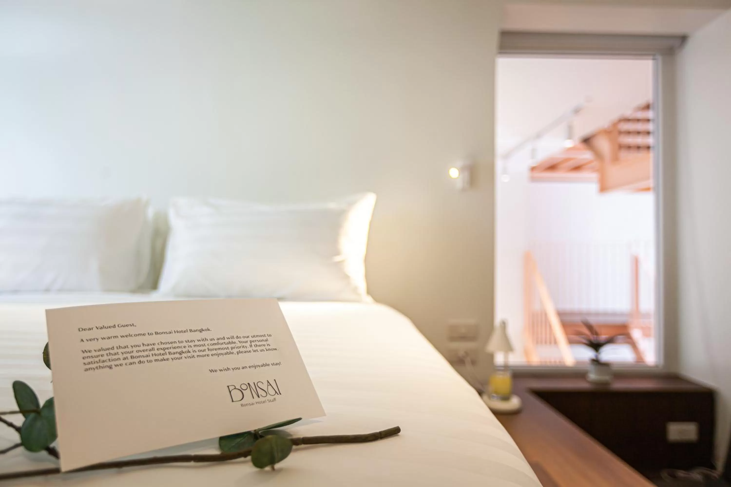 Bed in Bonsai Hotel Bangkok