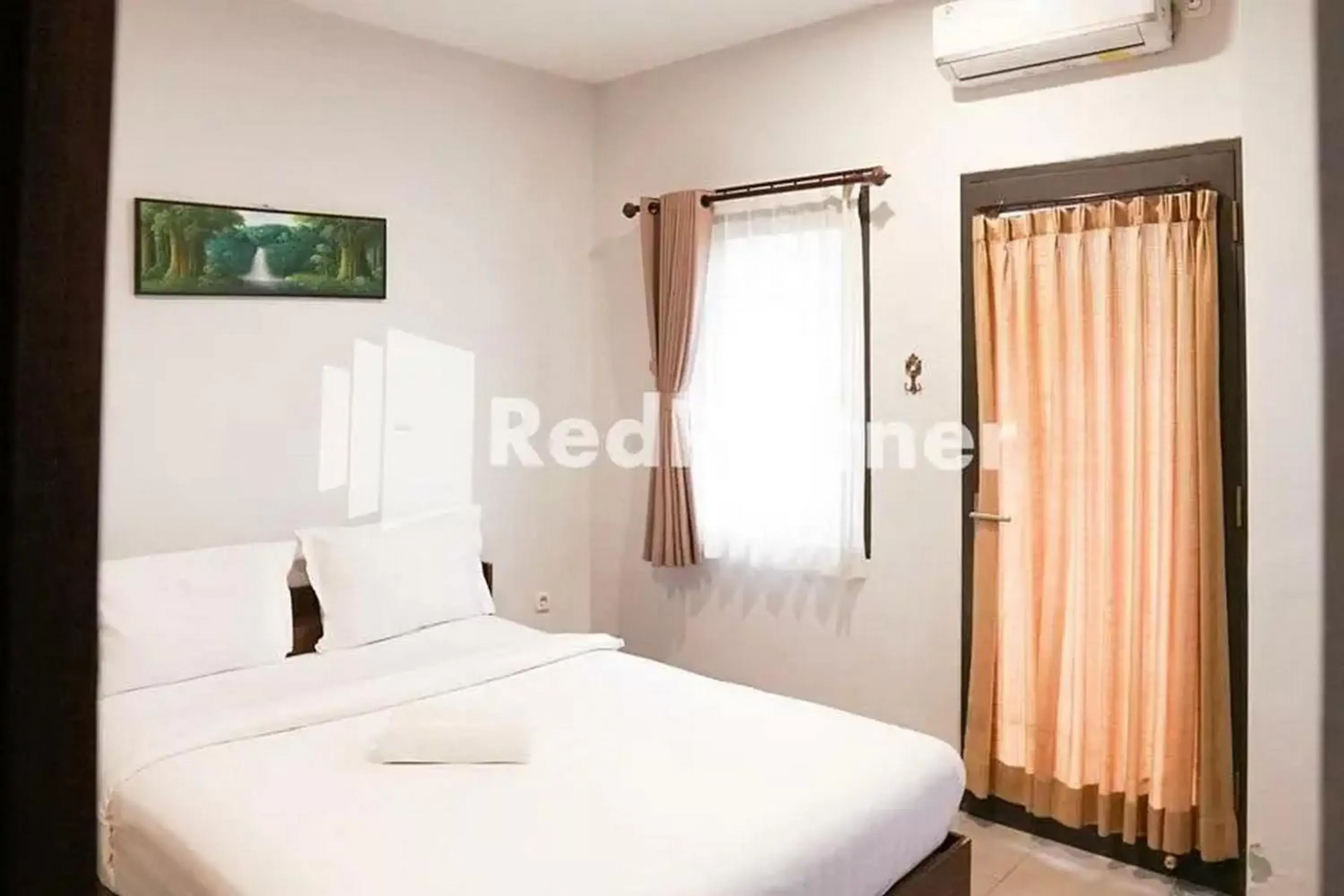 Bed in Panorama Inn Residence Batu Redpartner Bed in Panorama Inn Residence Batu Redpartner