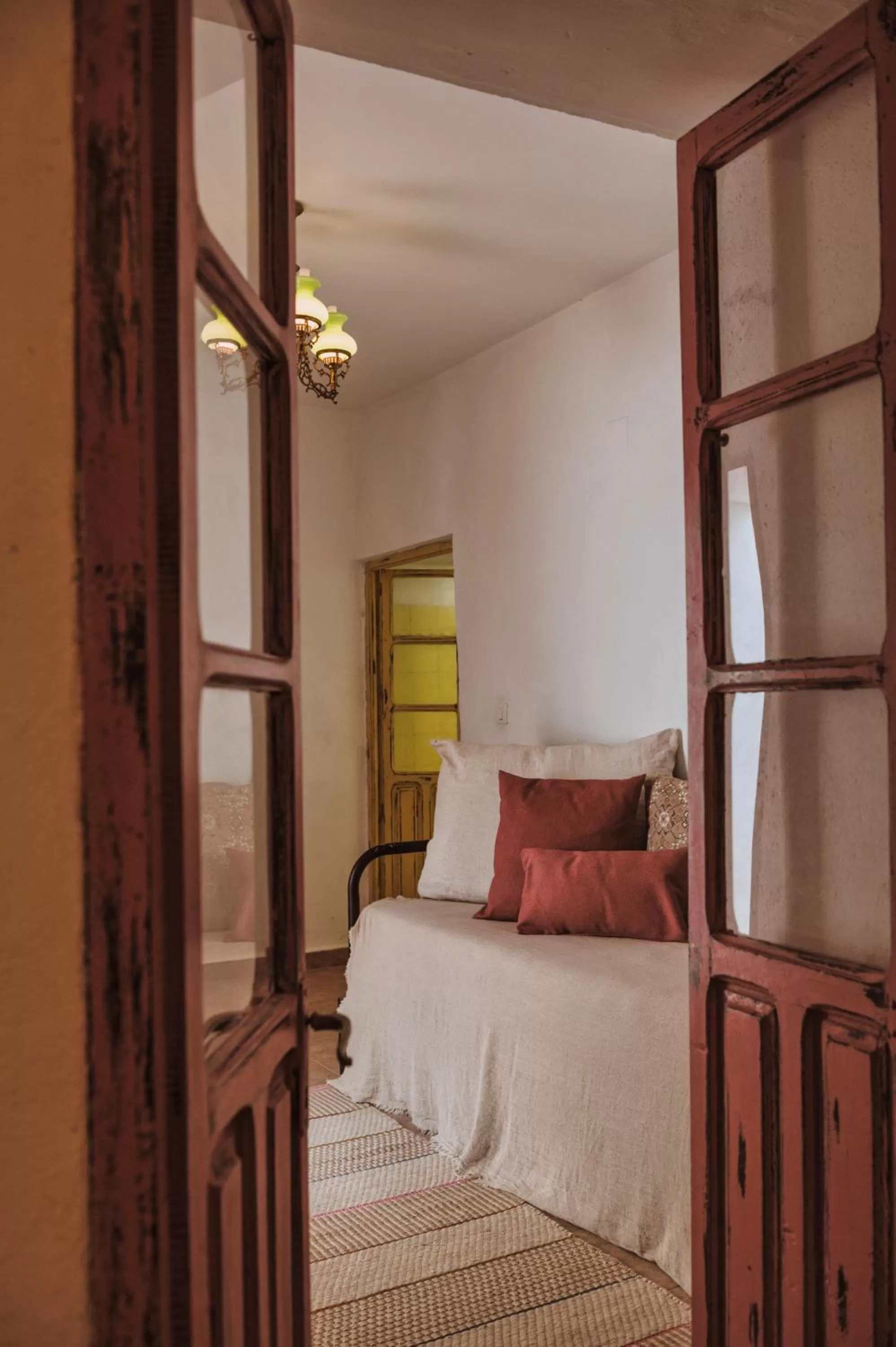 Bed in Encanto Guesthouse