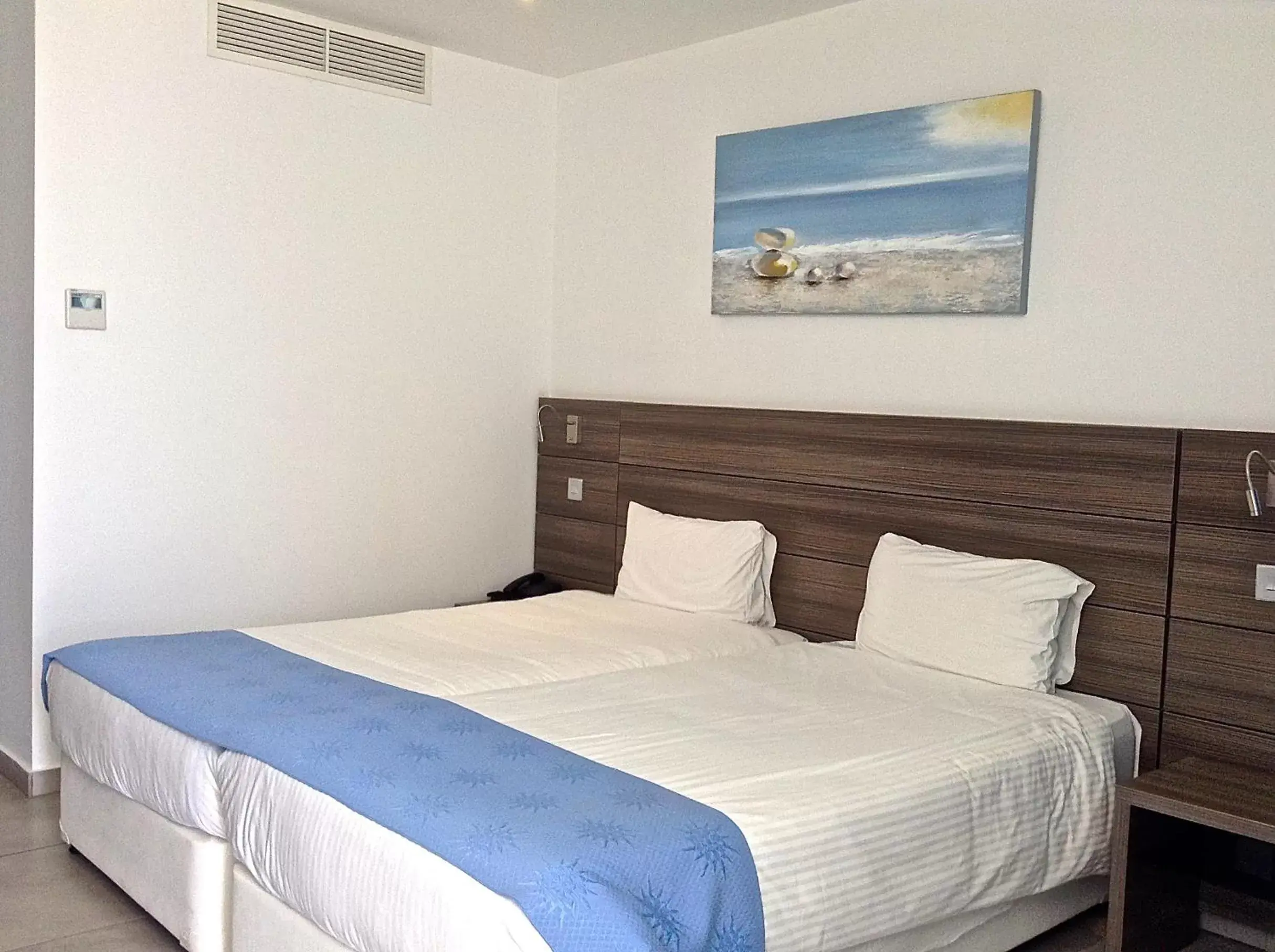 Photo of the whole room, Bed in Limanaki Beach Hotel & Suites