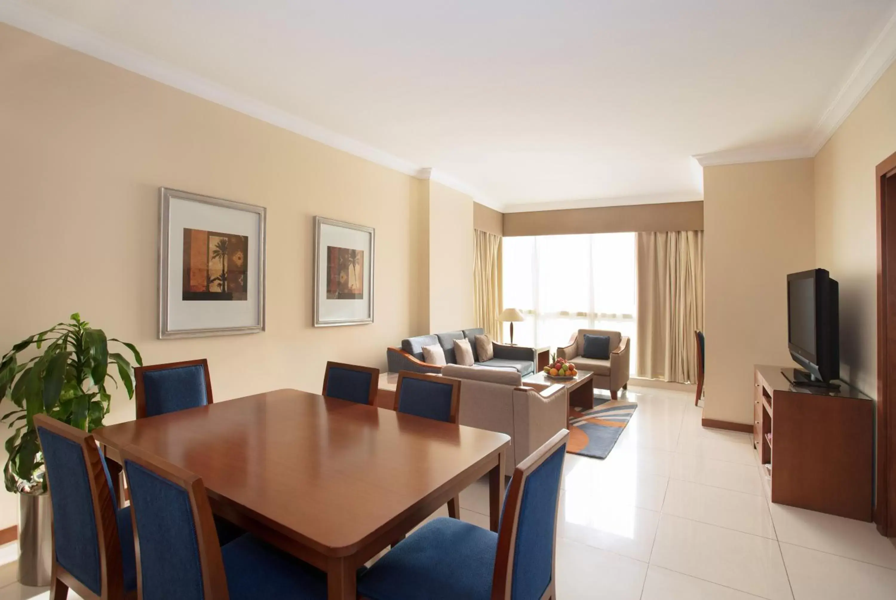 Living room, Dining Area in Al Rawda Arjaan by Rotana, Abu Dhabi