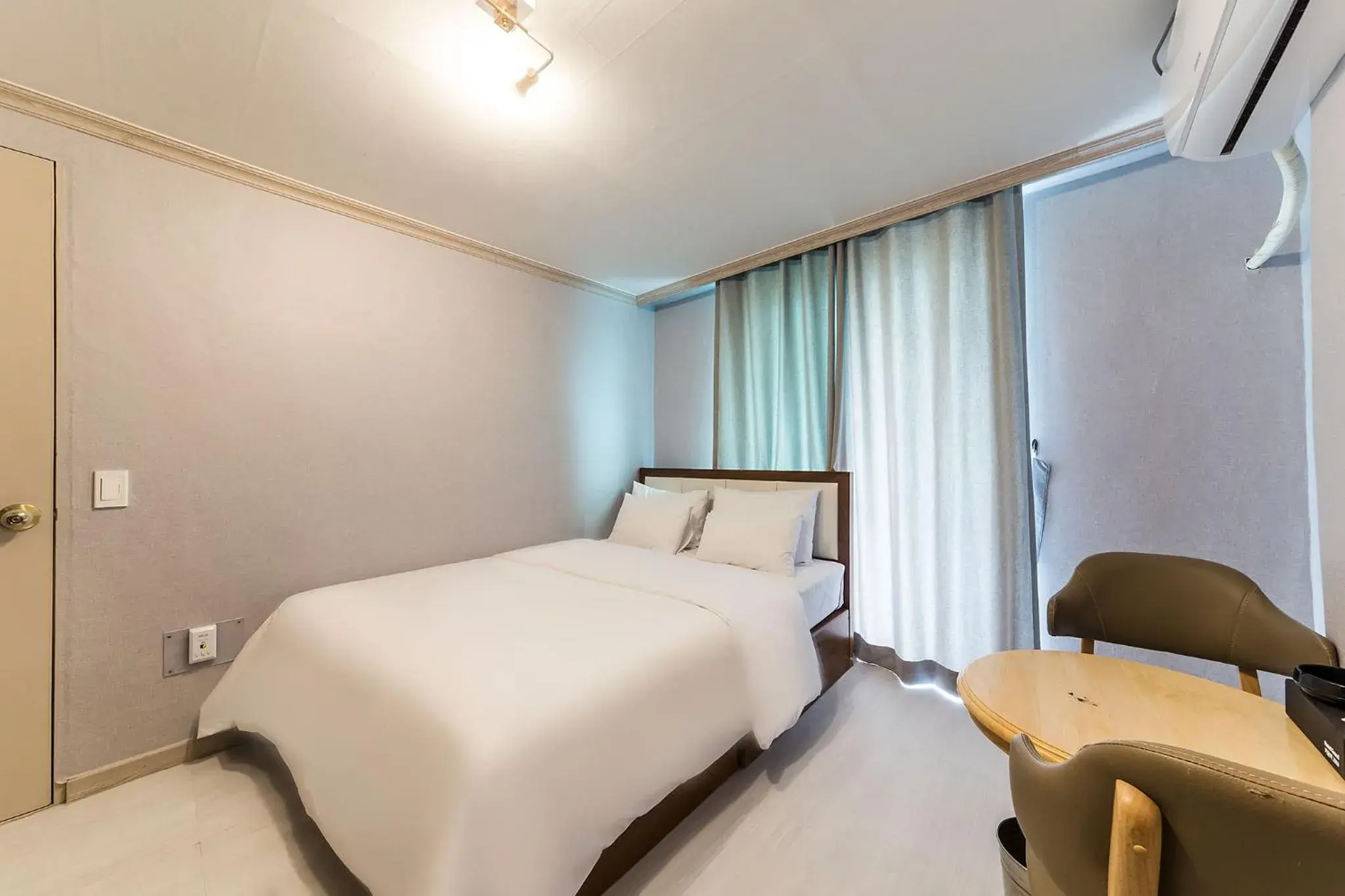 Bed in Goodstay Grand Motel Chuncheon