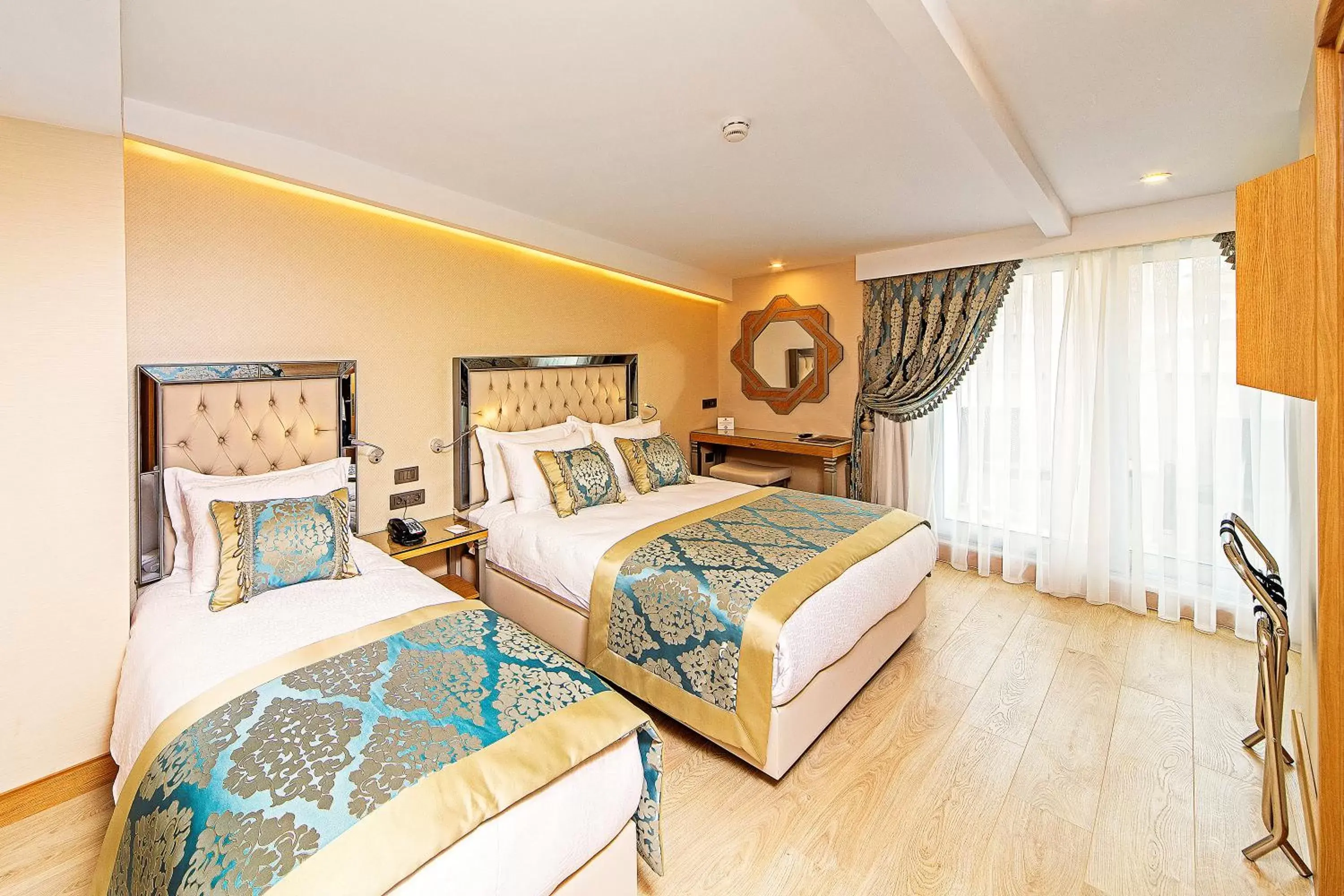 Bed in Mukarnas Taksim Hotel