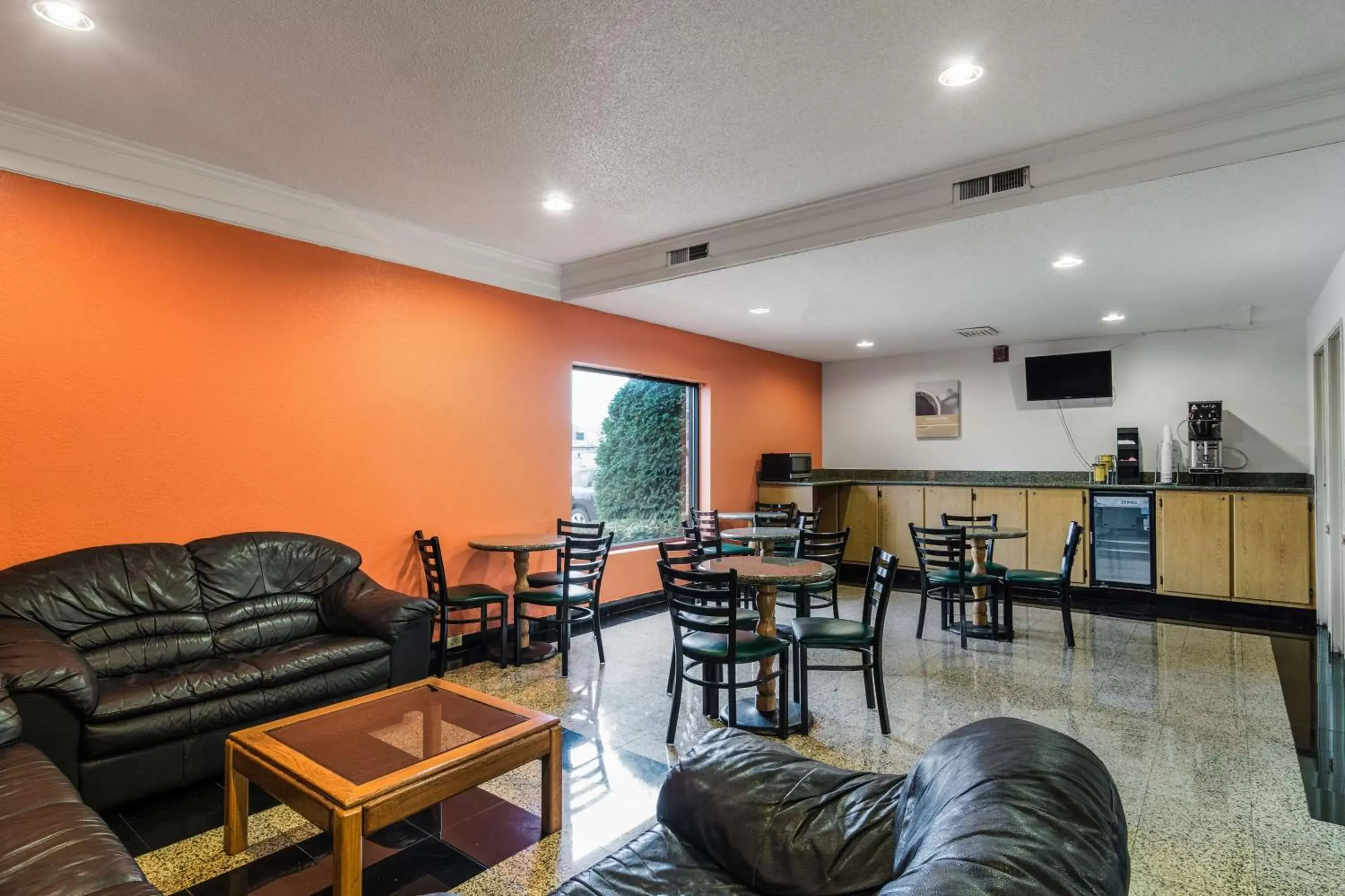 Communal lounge/ TV room in Motel 6-Libertyville, IL