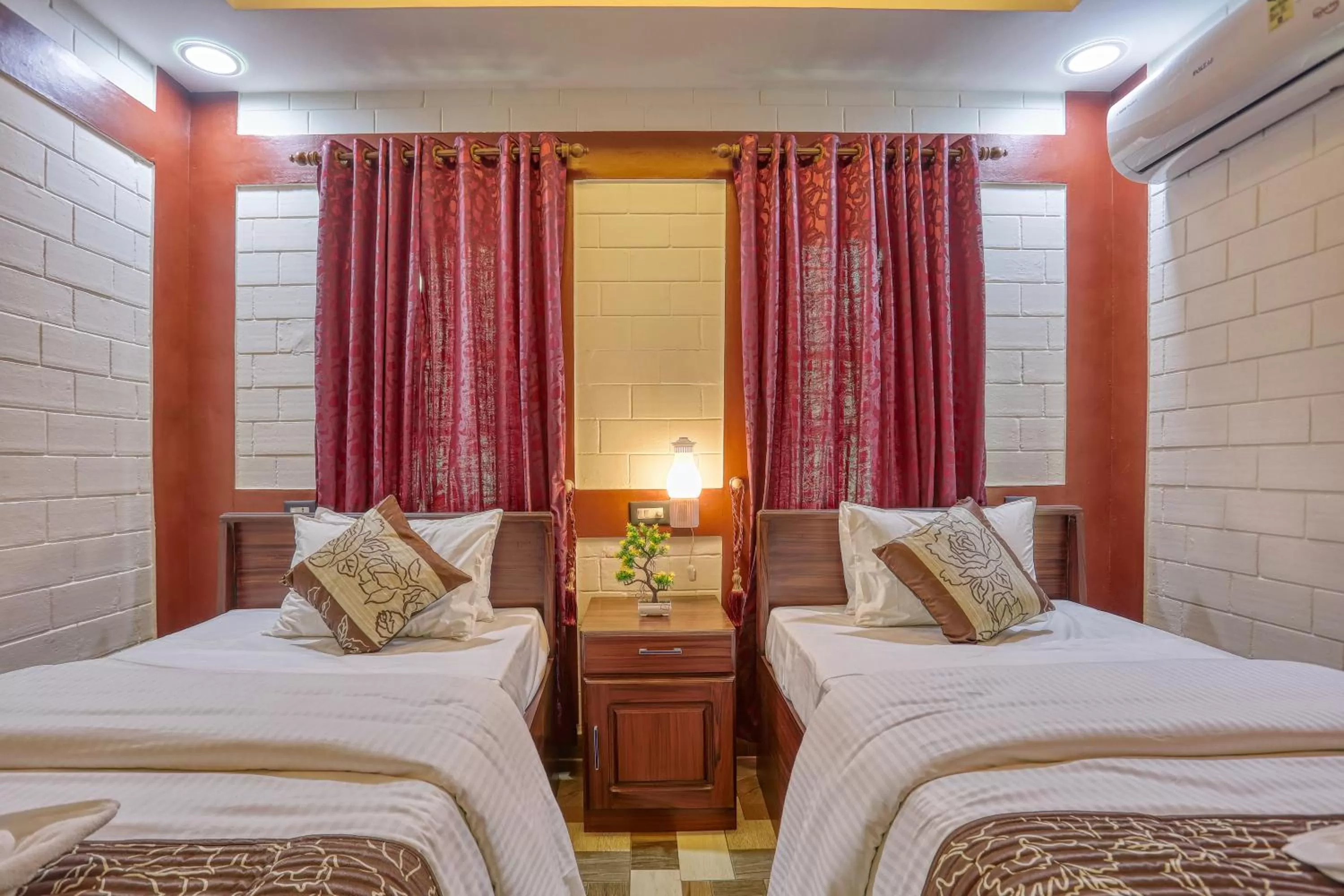 Bed in LEISURE VALLEY BEACH RESORT