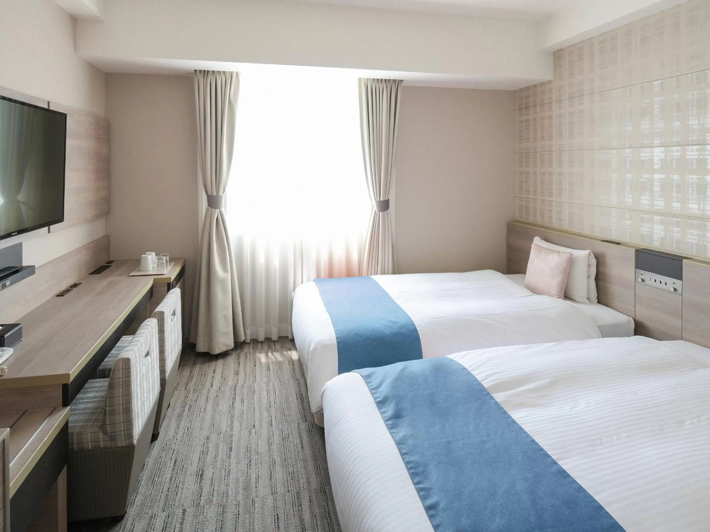 Bed in Vessel Inn Shigamoriyama Station