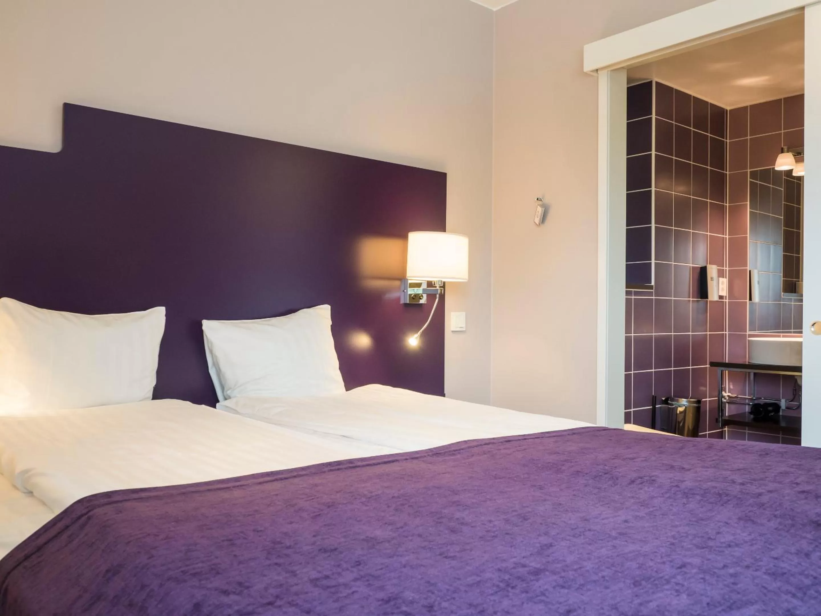 Bed in Finn Apartments