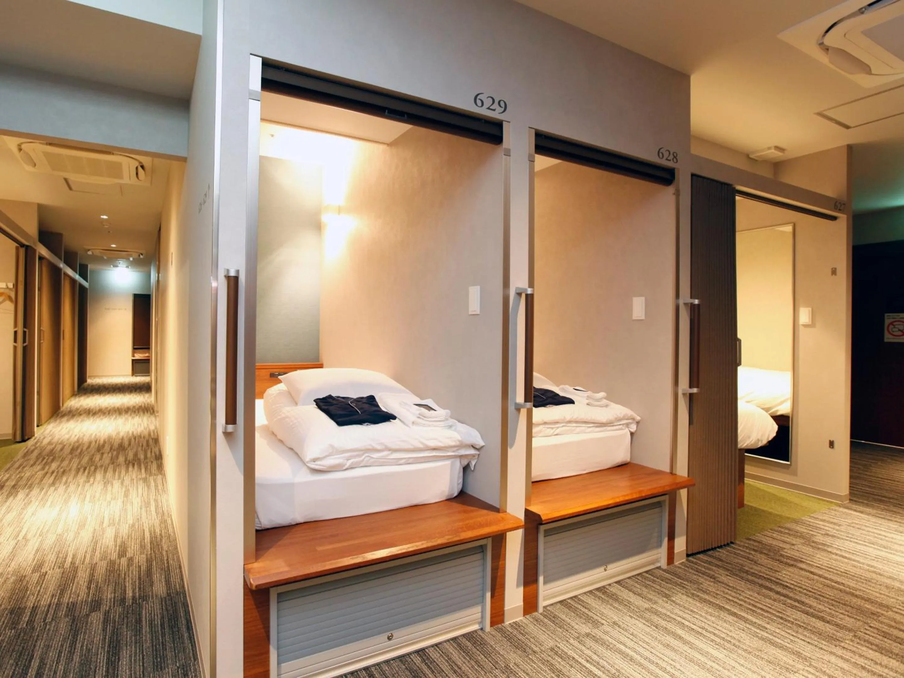 Bed in Gardens Cabin