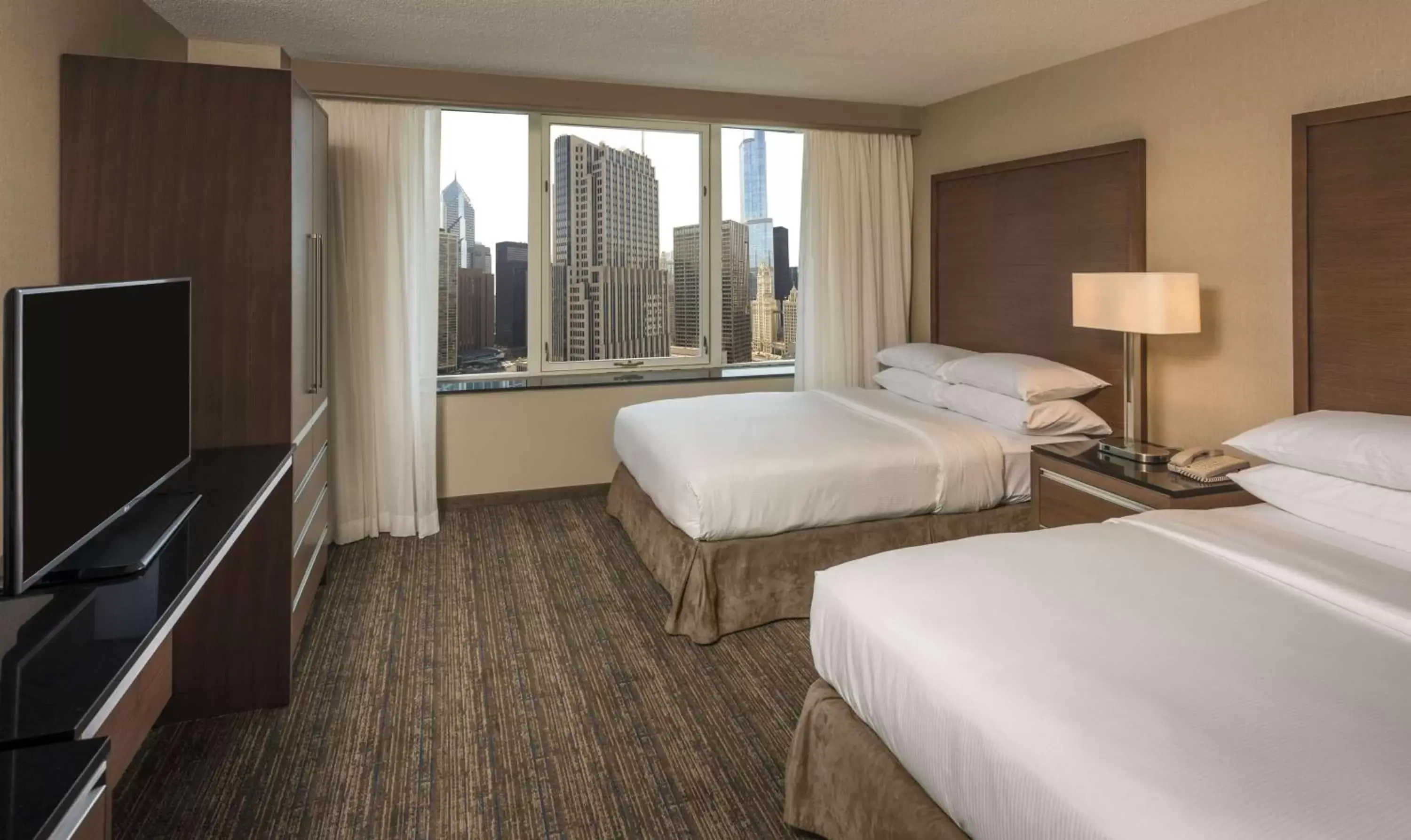 Bed in Embassy Suites by Hilton Chicago Downtown Magnificent Mile