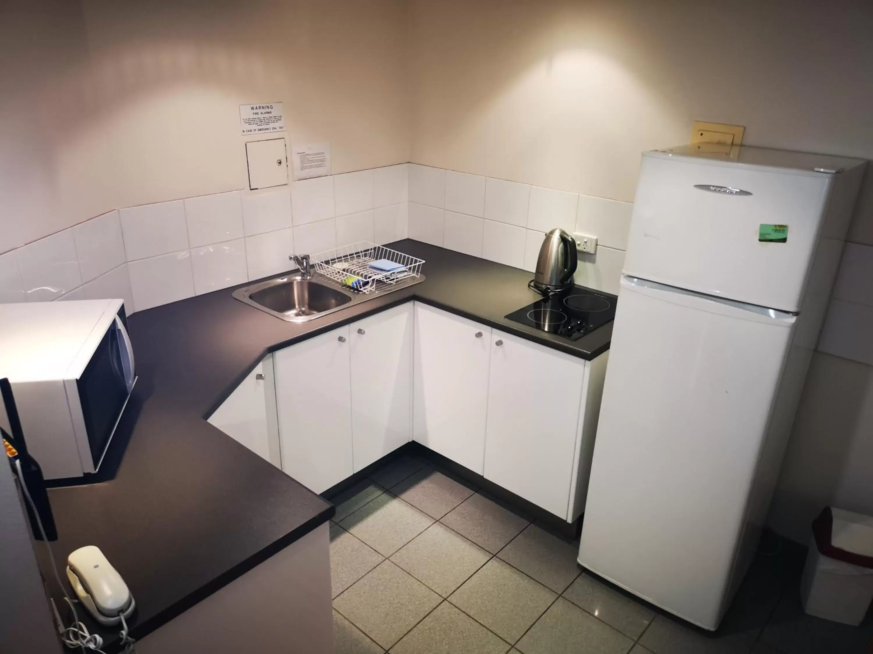 Kitchen/Kitchenette in Abbey On Roma Hotel & Apartments