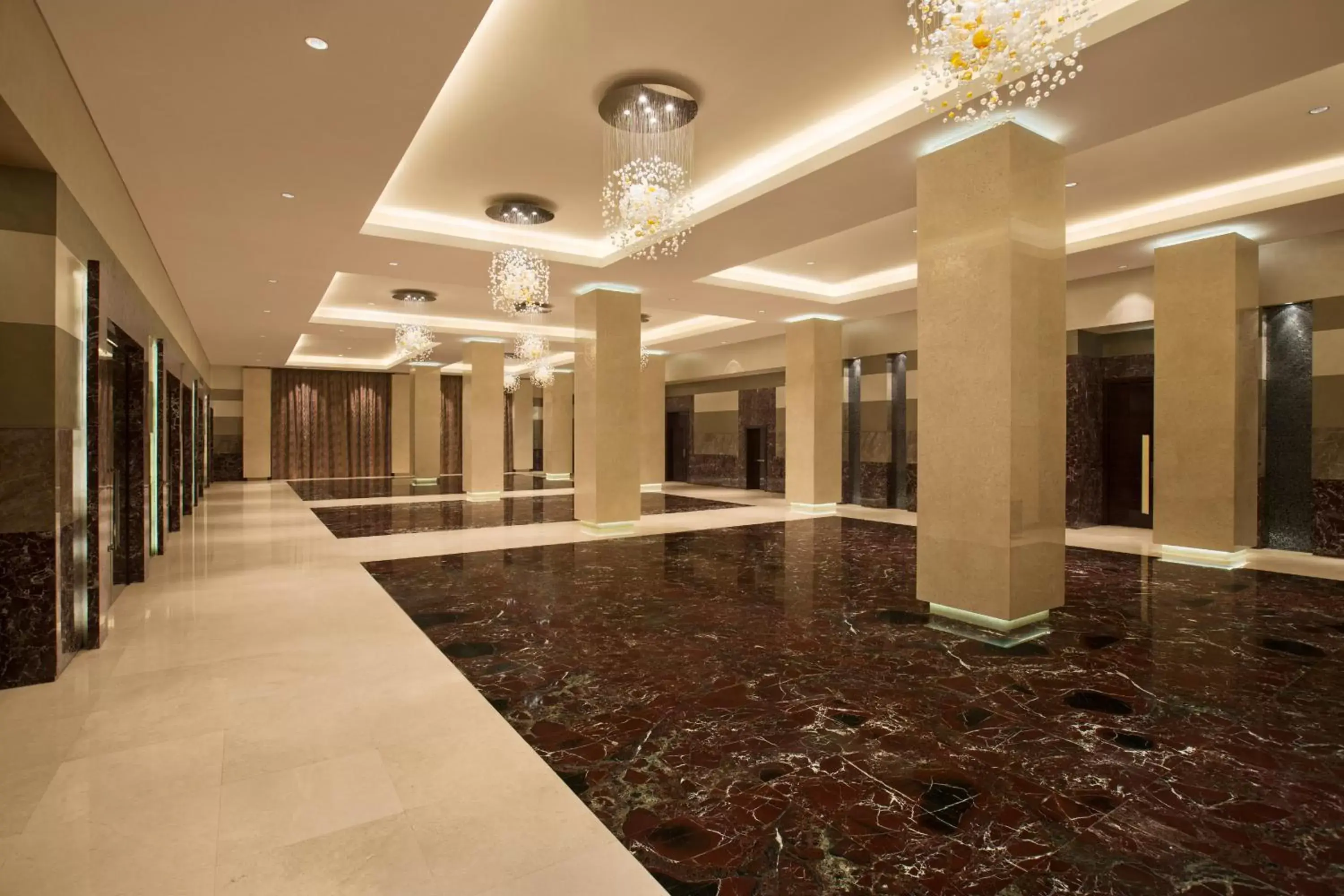 Lobby or reception in Millennium Al Rawdah Hotel