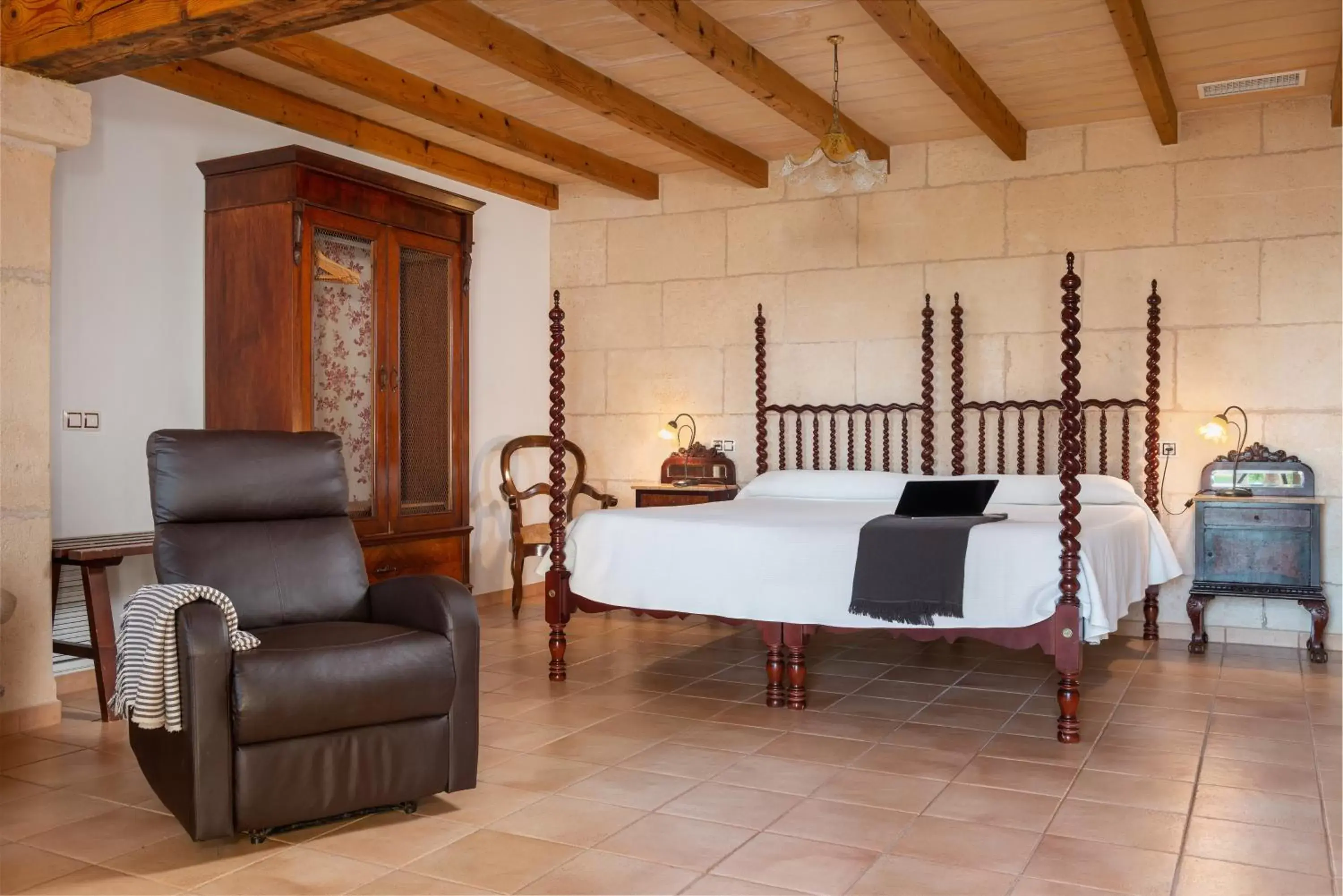 Bed in Finca Hotel Can Canals & Spa Bed in Finca Hotel Can Canals & Spa
