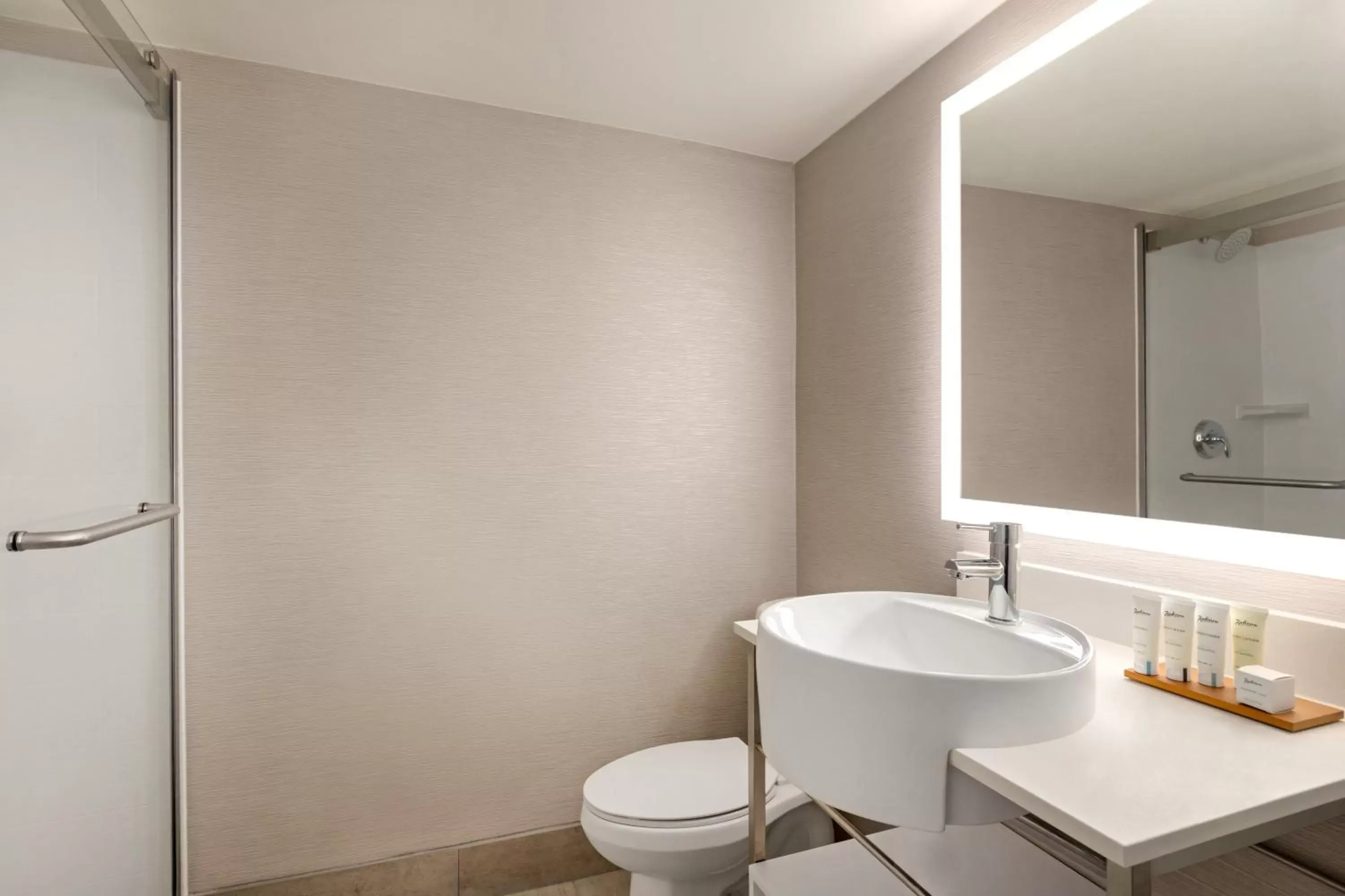 Bathroom in Holiday Inn Philadelphia Arpt-Stadium Area by IHG Bathroom in Holiday Inn Philadelphia Arpt-Stadium Area by IHG