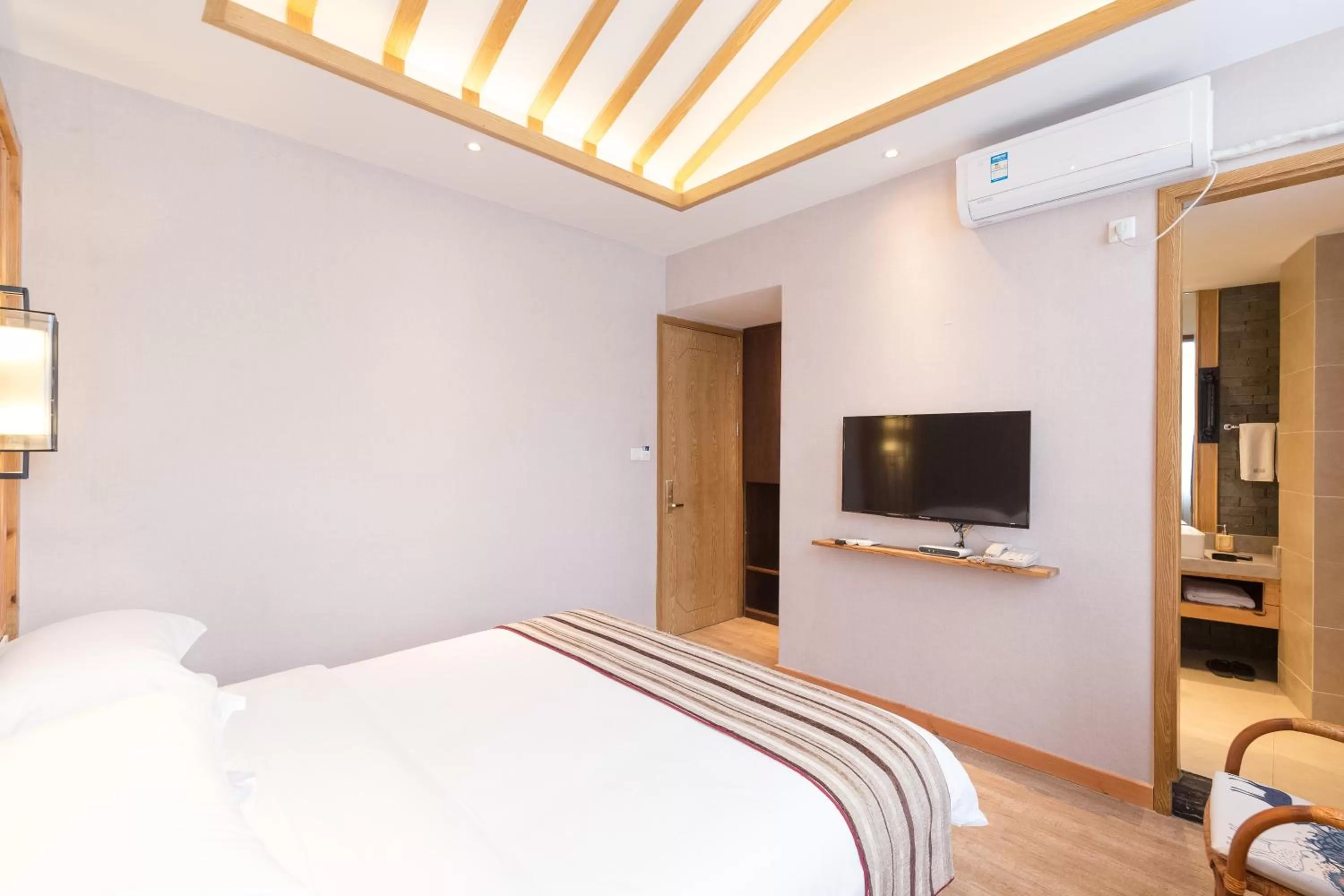 Photo of the whole room, Bed in Mild Spring Boutique Hotel