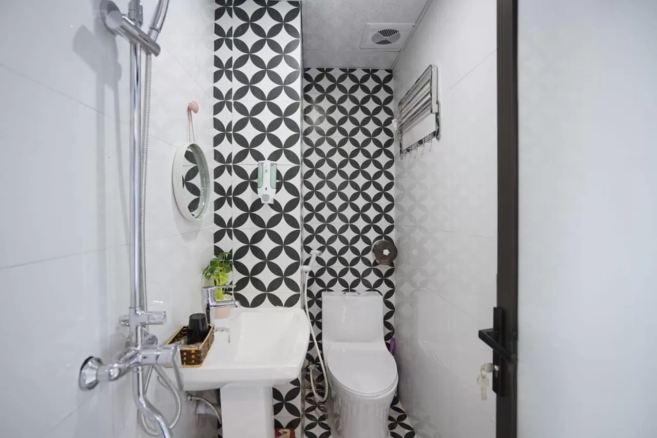 Bathroom in Almor Hostel With Pool in right center