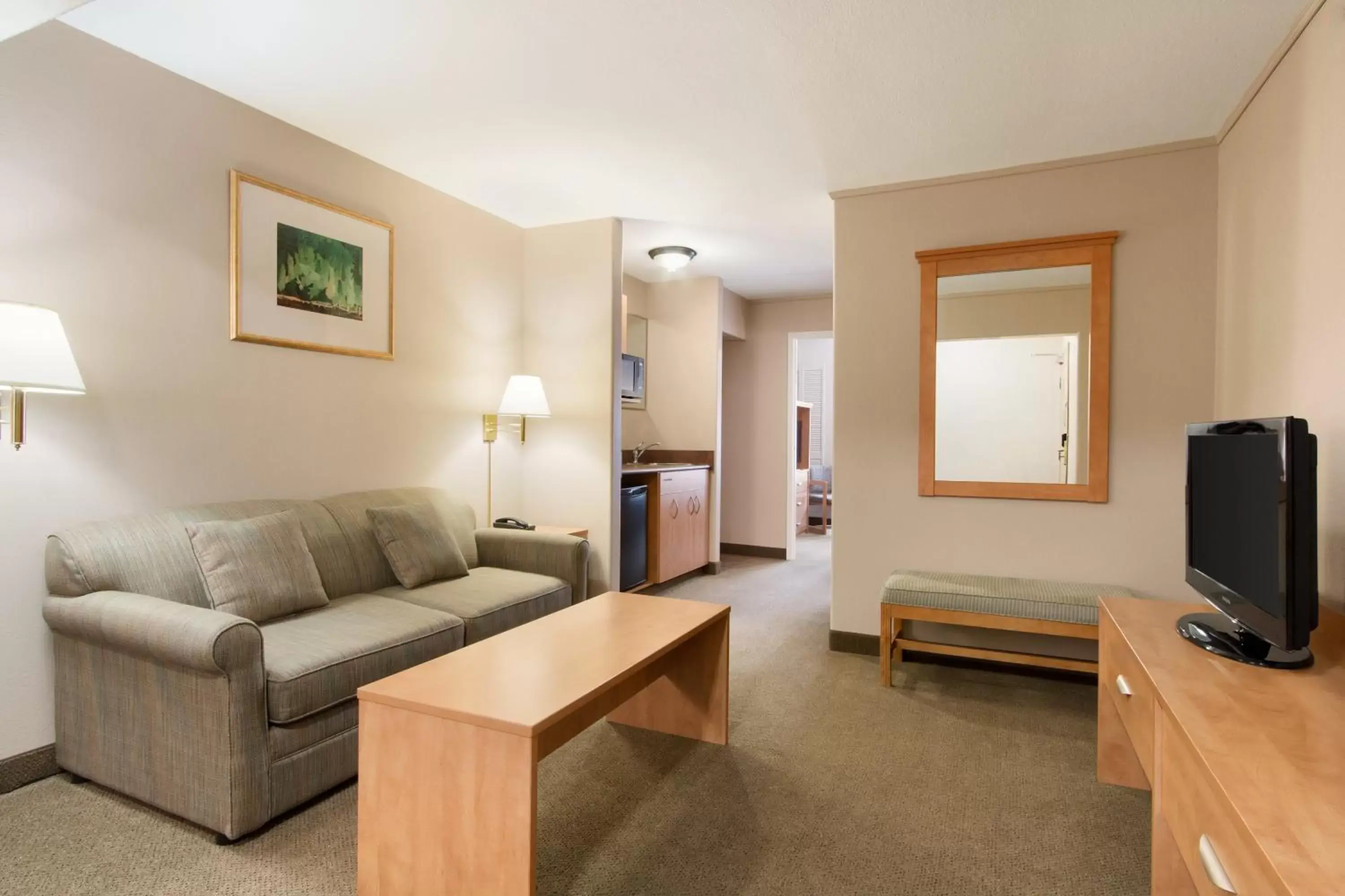 Living room, Seating Area in Days Inn & Suites by Wyndham Thunder Bay