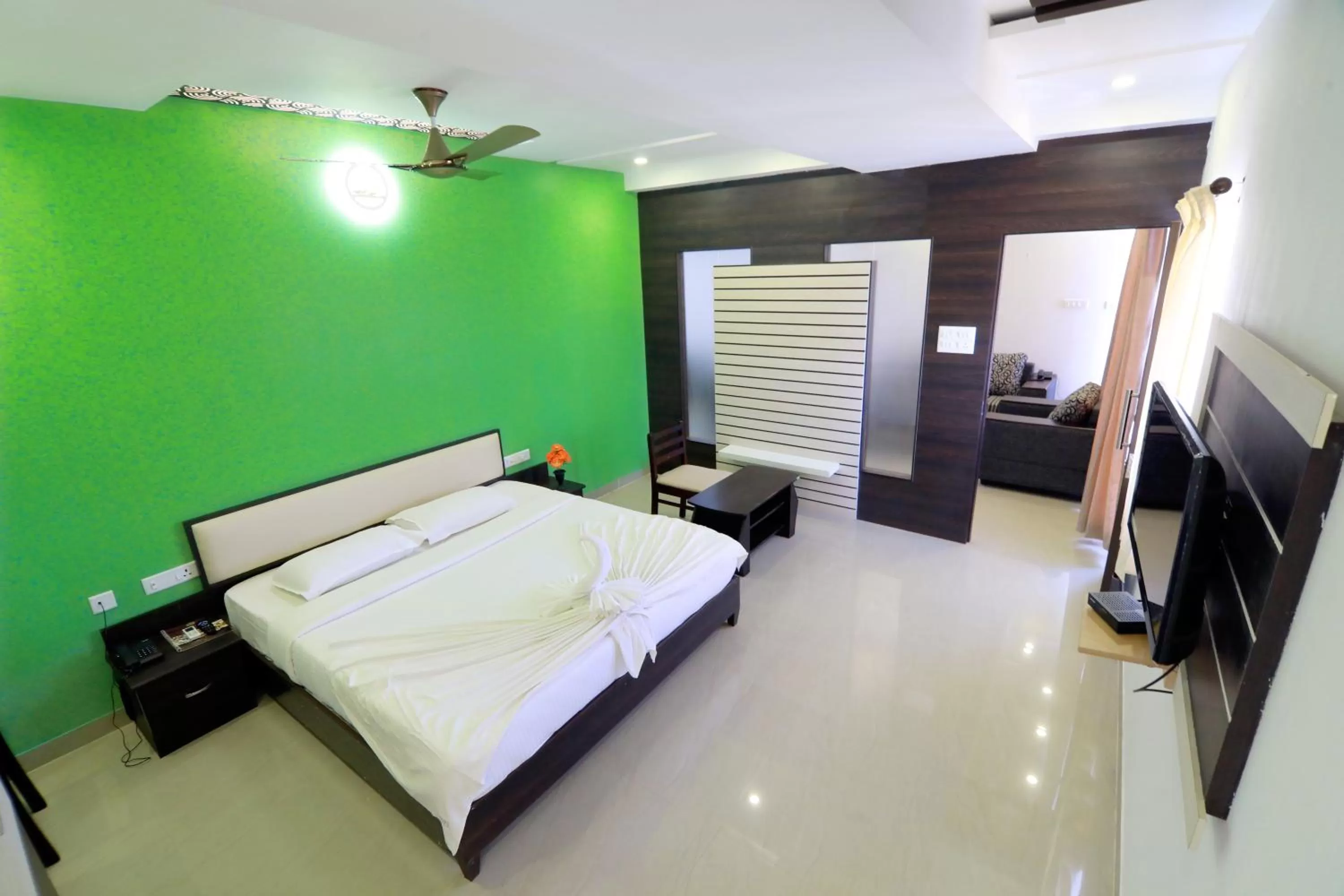 Bed in Hotel Ambai Grand