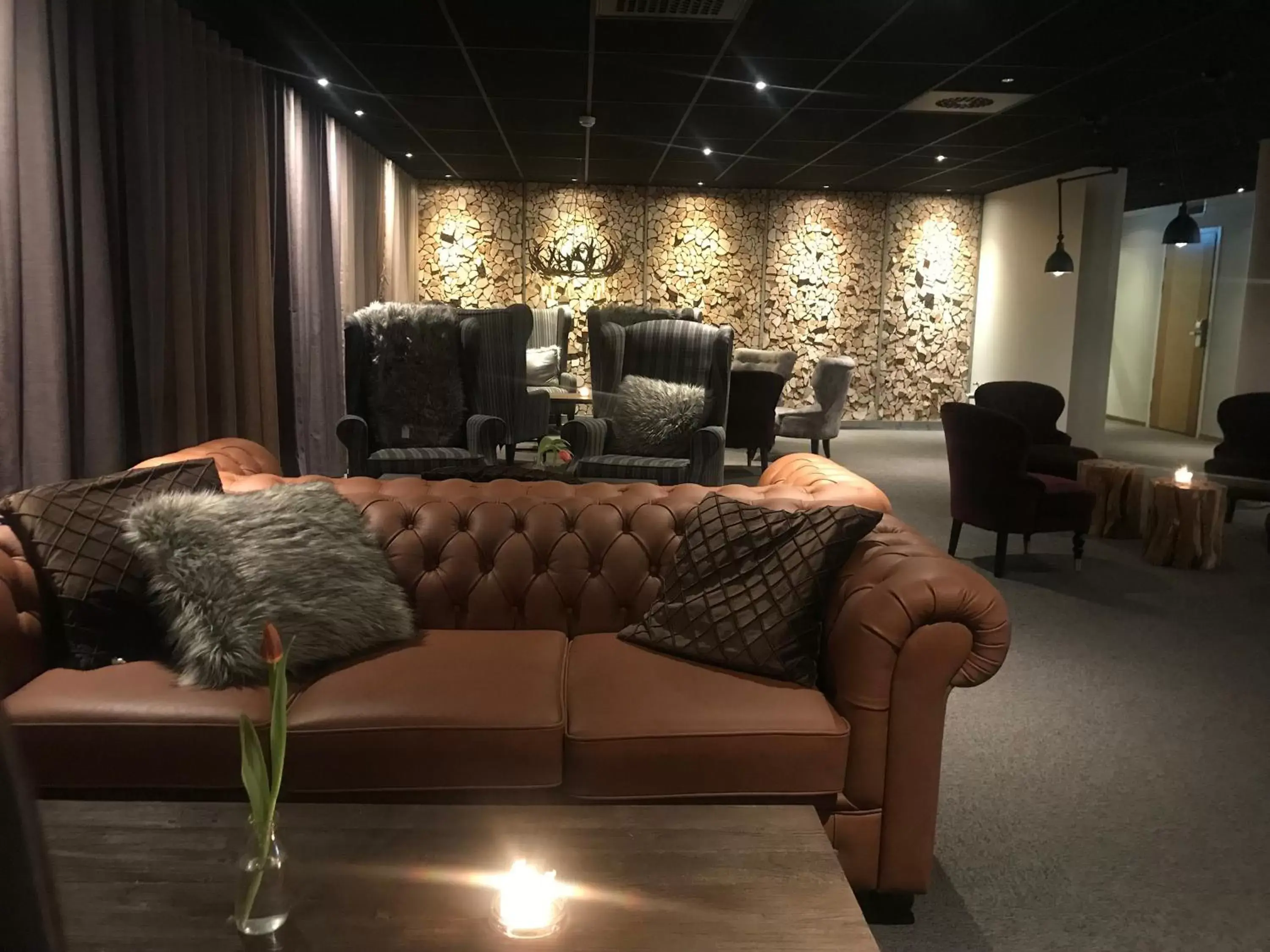 Communal lounge/ TV room, Seating Area in Comfort Hotel Skellefteå