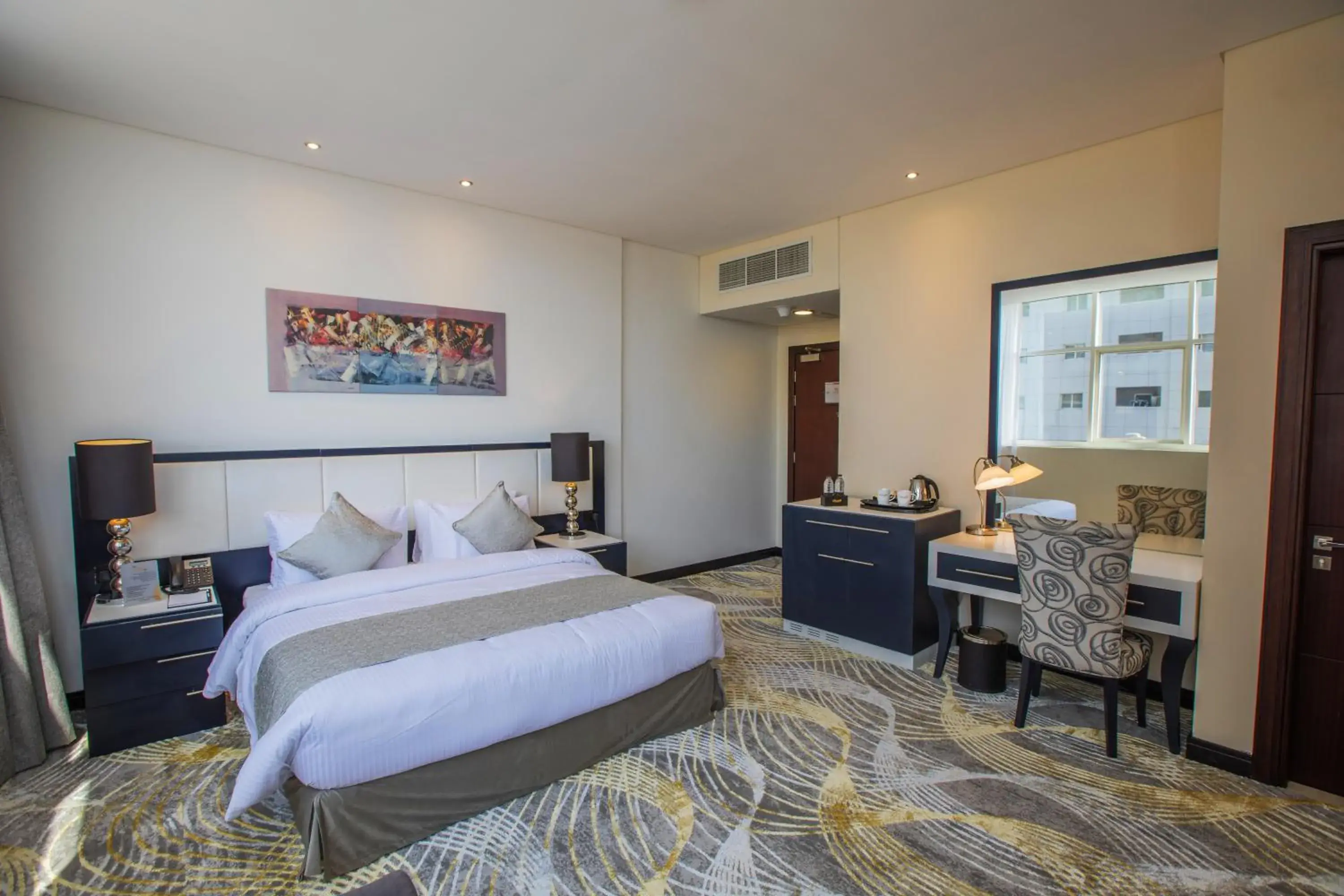 Bed in Grand Villaggio Hotel Abu Dhabi