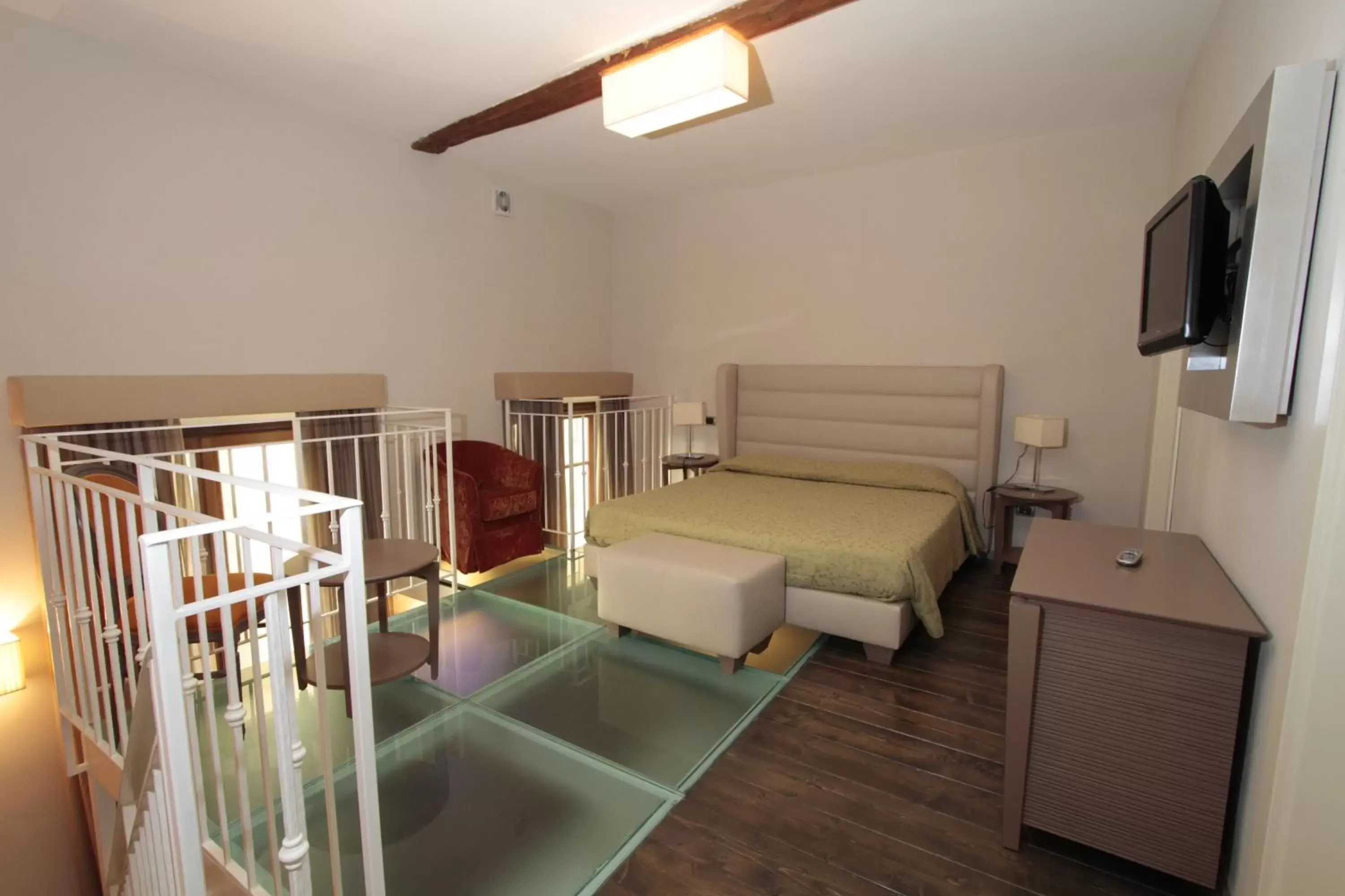 Bedroom, Seating Area in Residence La Repubblica