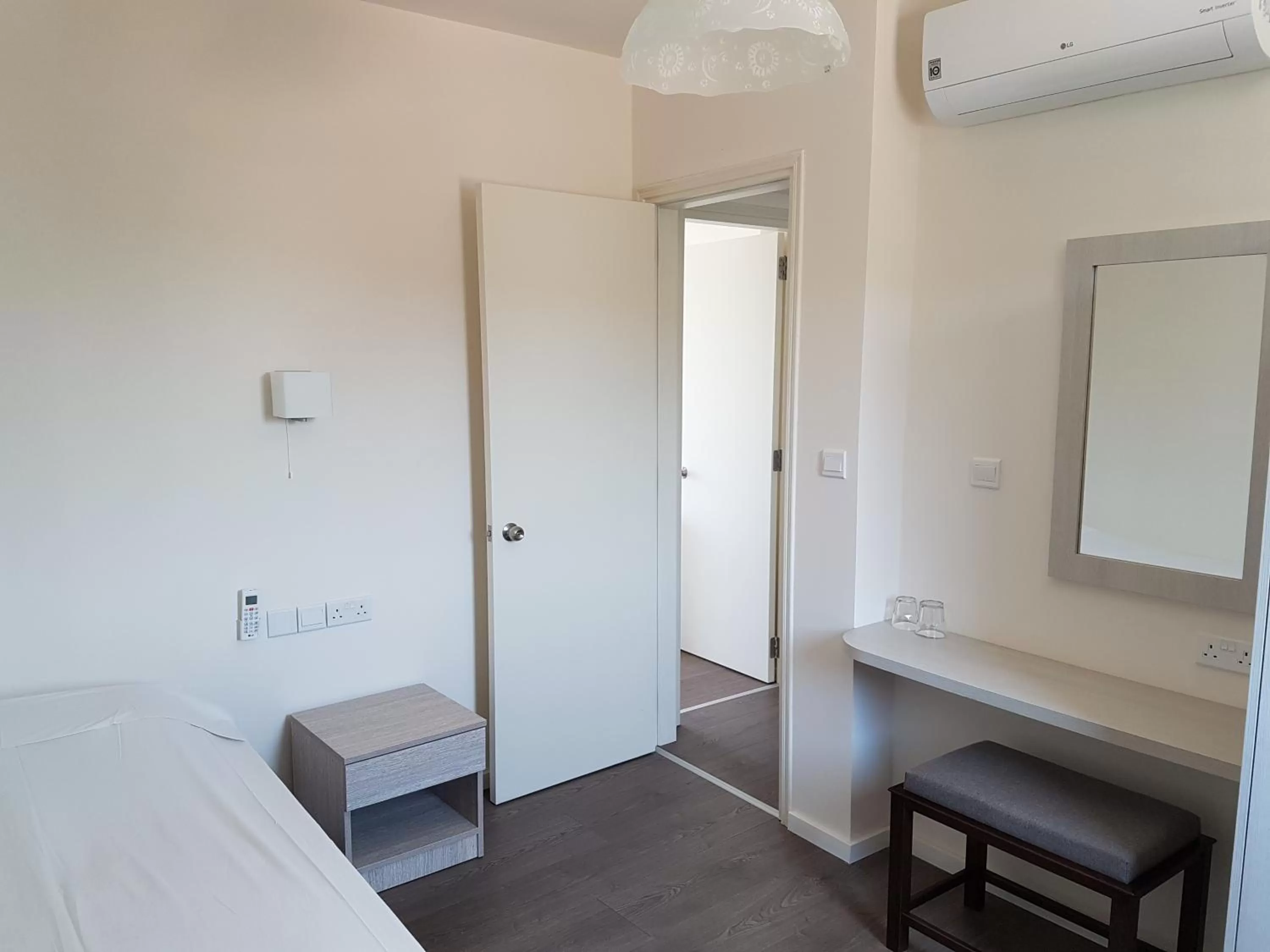 Bed in Aphrodite Beach Hotel