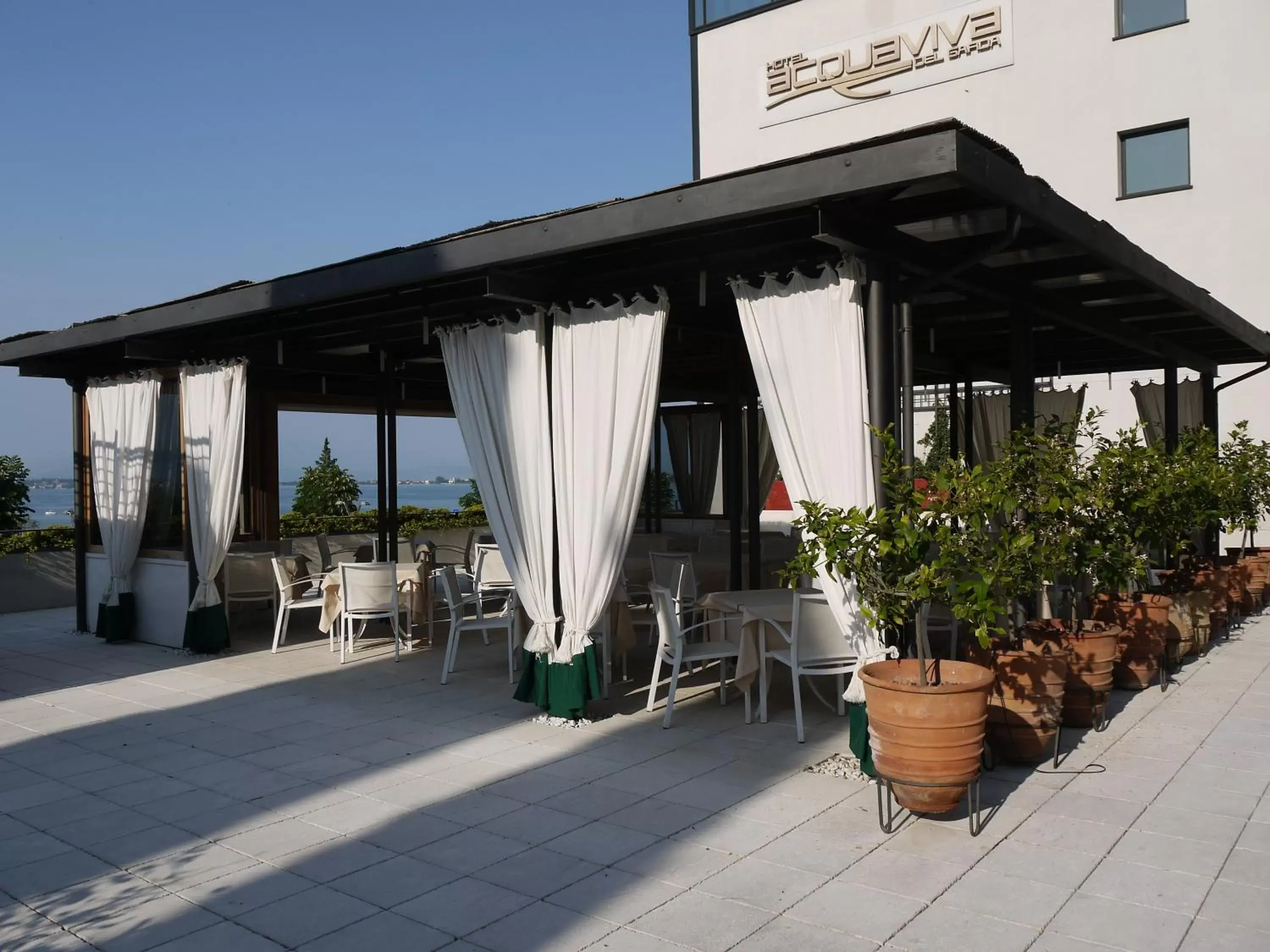 Restaurant/places to eat, Patio/Outdoor Area in Hotel Acquaviva Del Garda