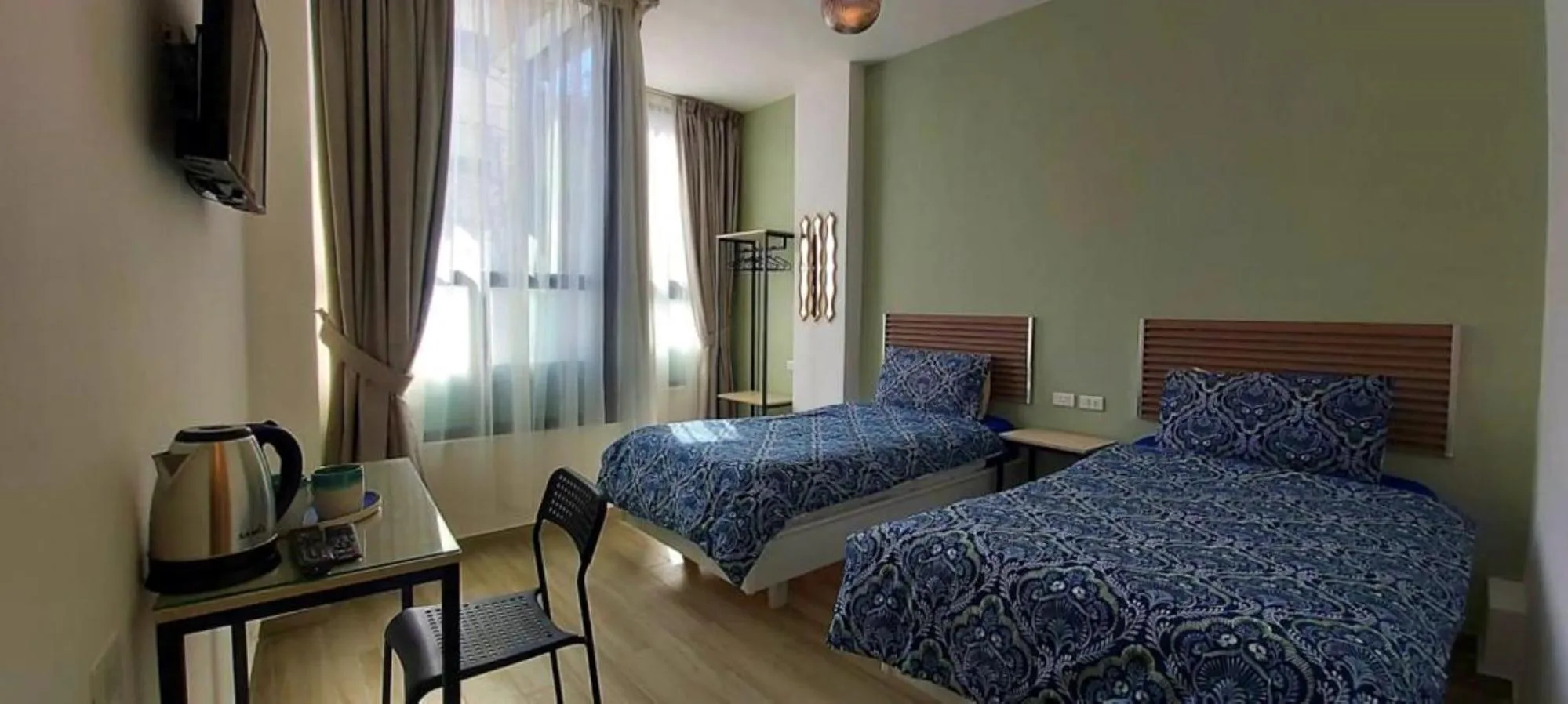 Bed in Arabesque Hotel