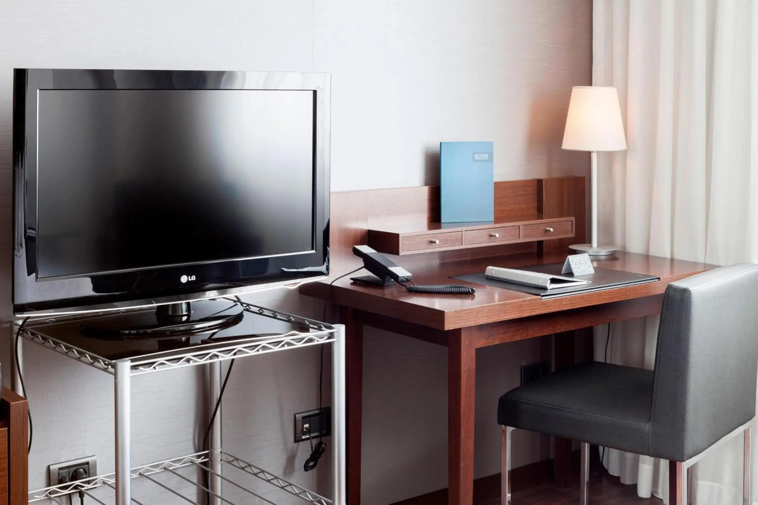 Photo of the whole room, TV/Entertainment Center in AC Hotel Gijón by Marriott