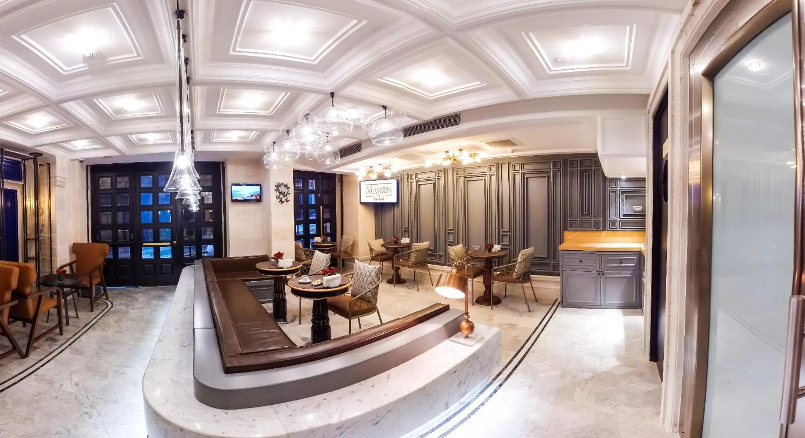 Seating area in Maroon Tomtom